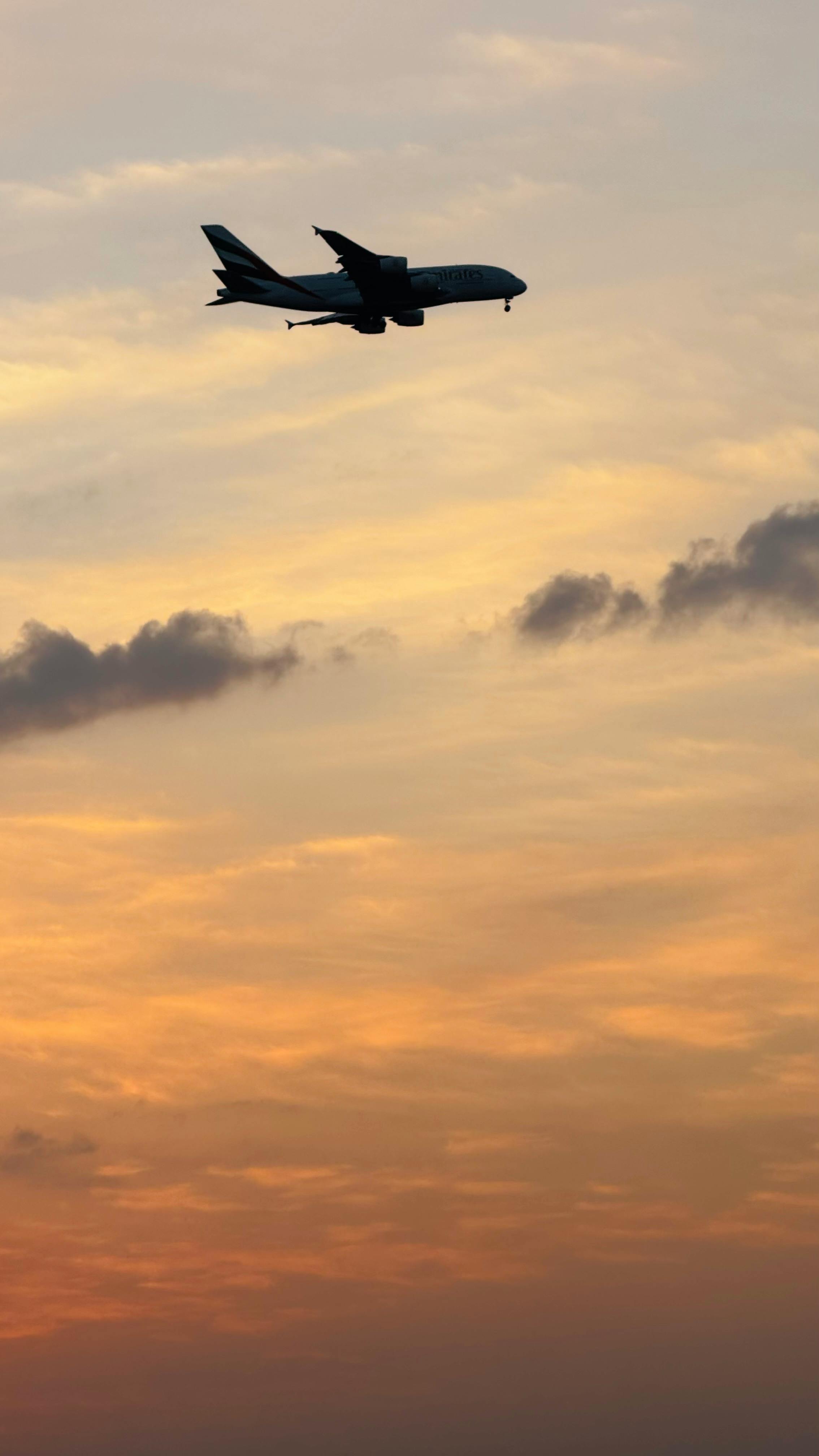 Shadow Image of a Plane Flying during Sunset · Free