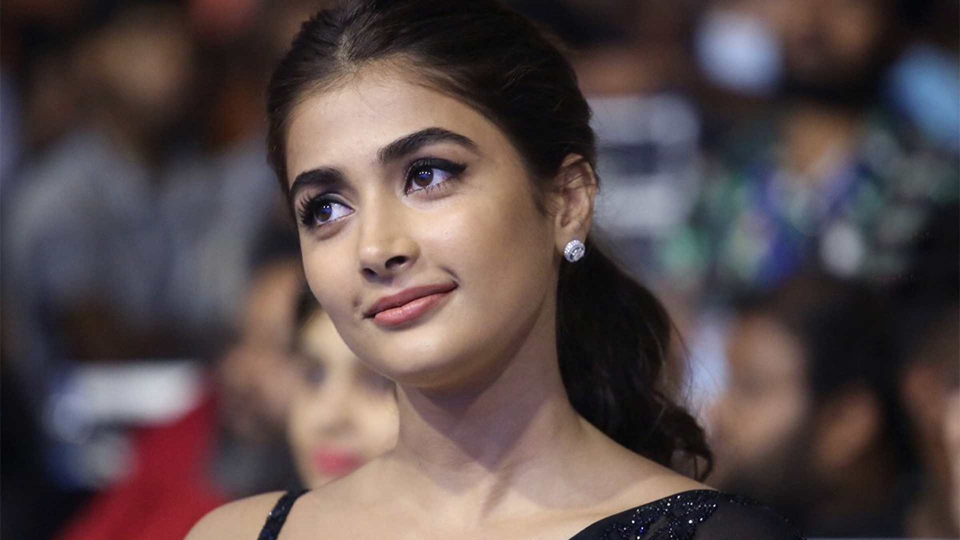 Beautiful Actress Pooja Hegde Is Sitting In Blur Background Wearing Black Saree HD Girls Wallpaper