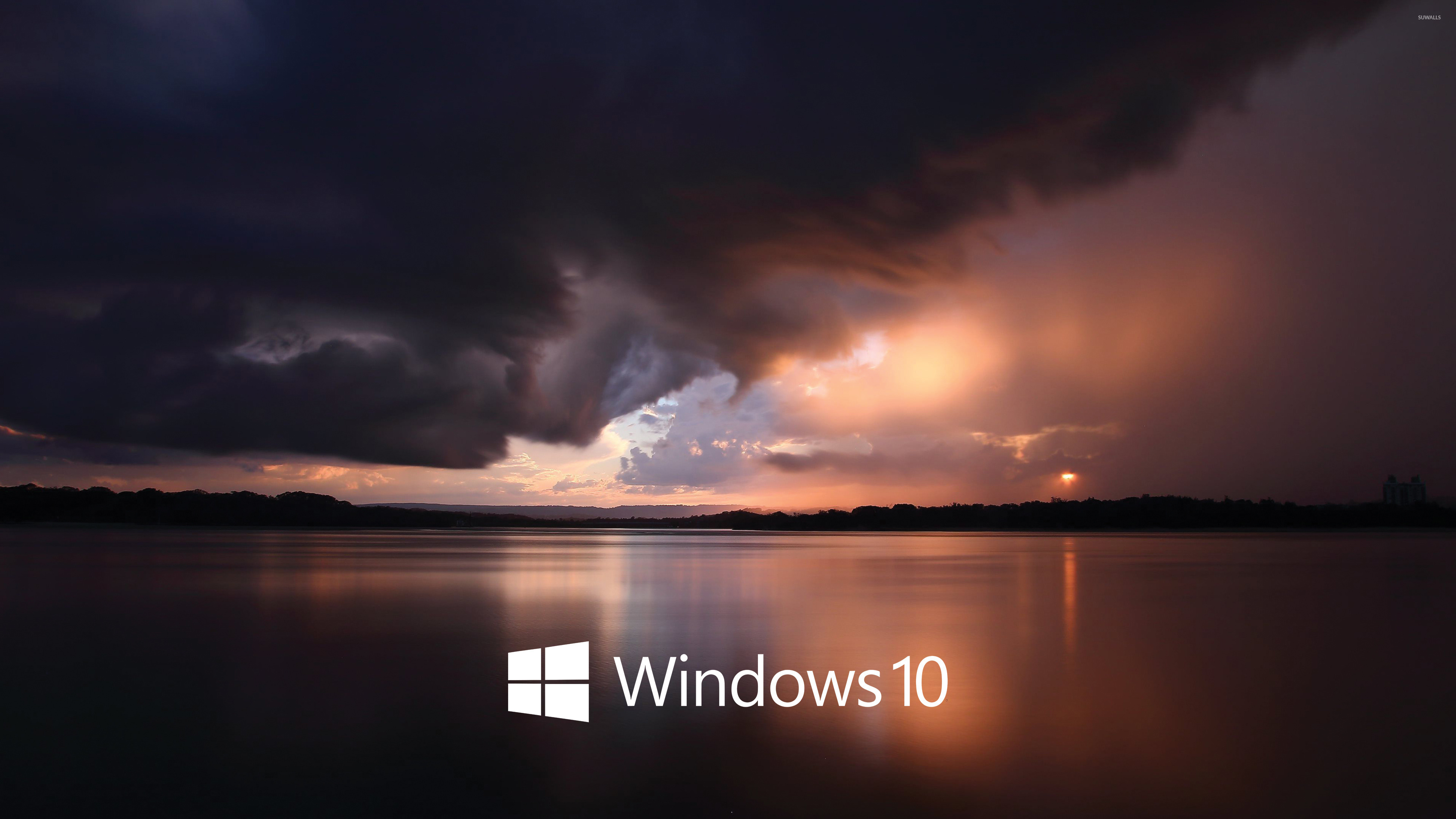 Windows 10 white text logo over the stormy sea wallpaper wallpaper