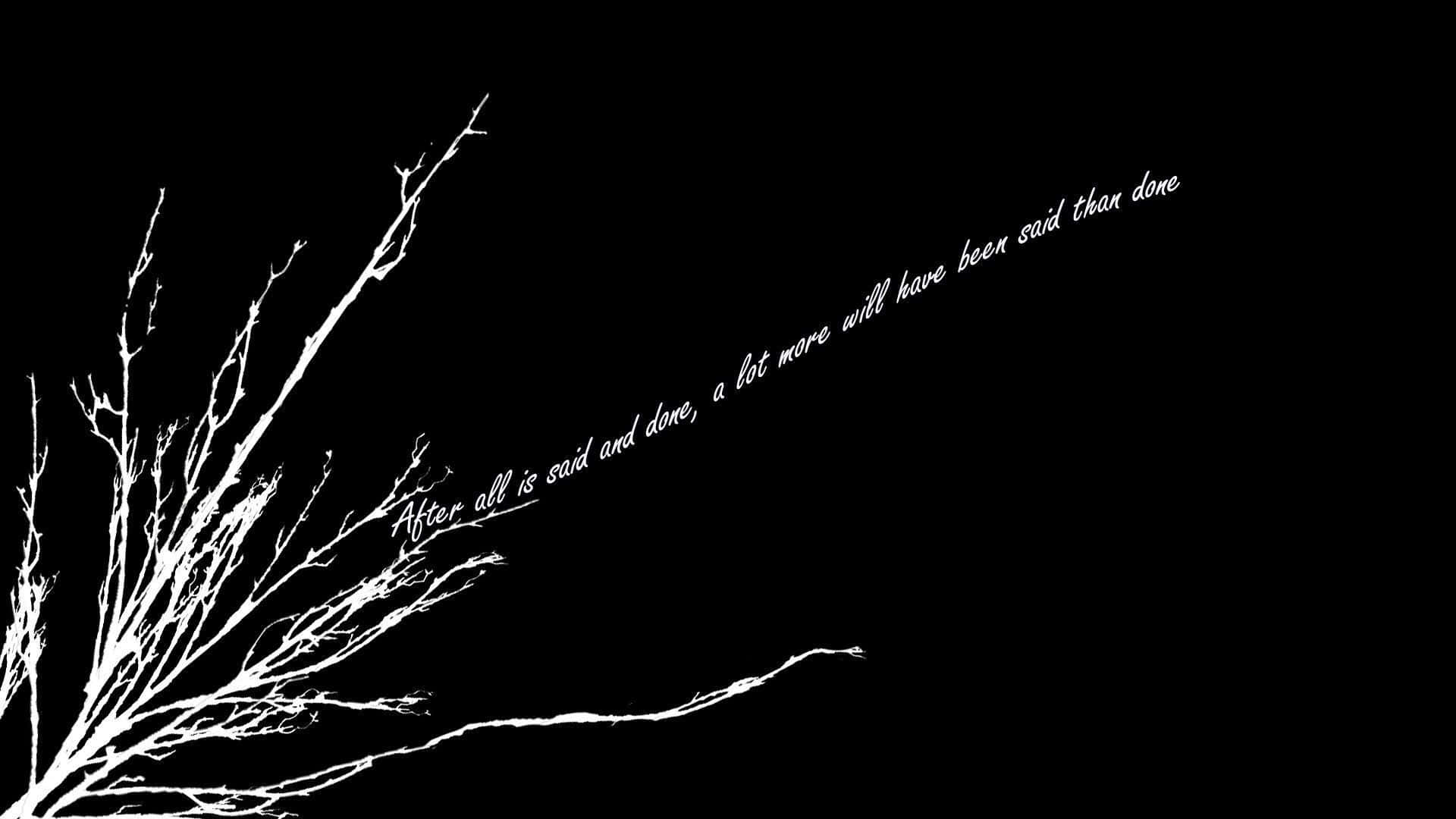 Download A Black And White Image Of A Tree With A Quote Wallpaper