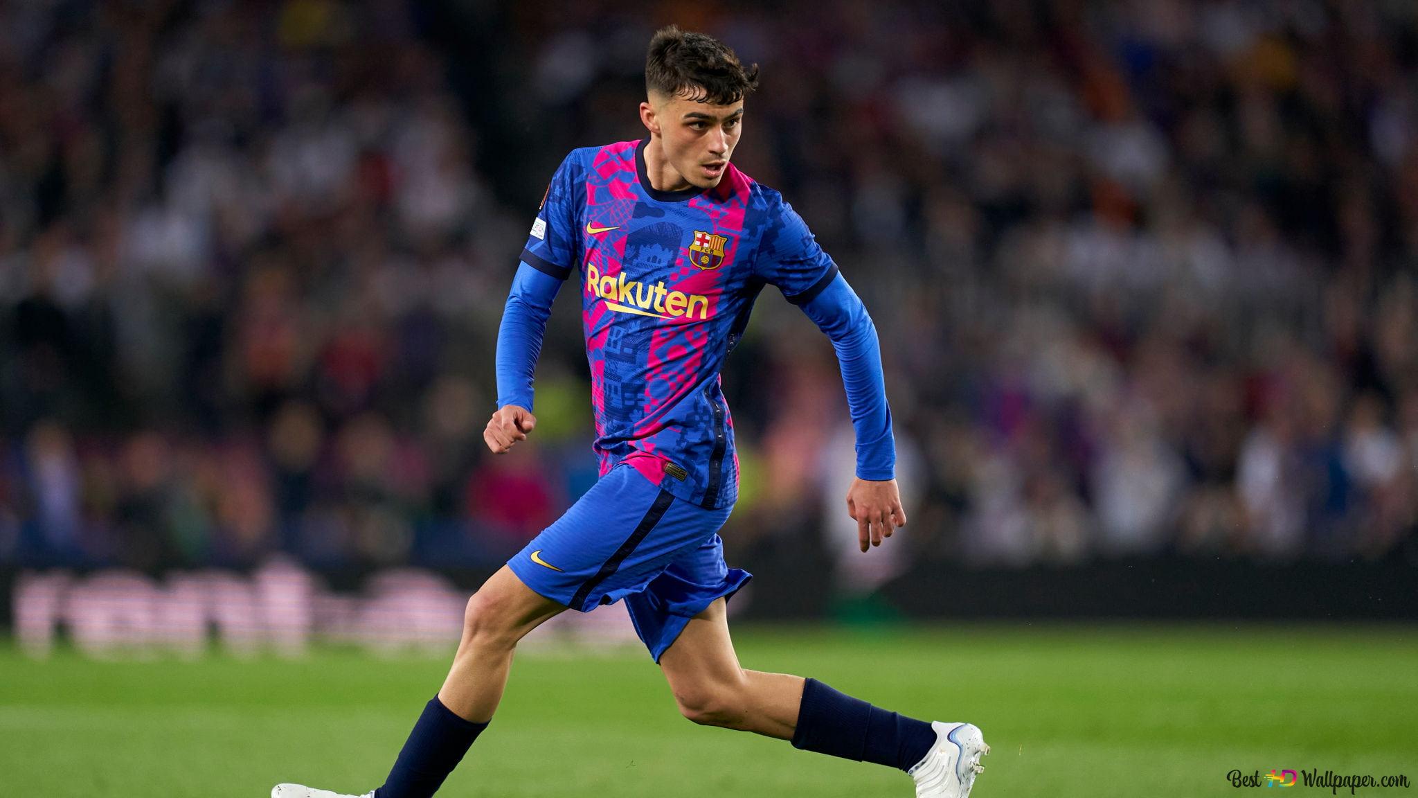 Barcelona football player Pedri drives a soccer ball 2K wallpaper download