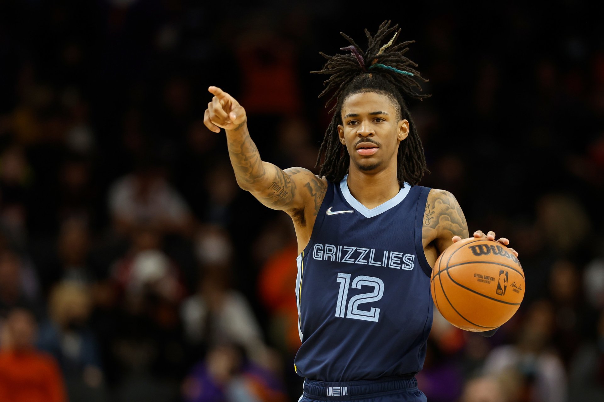 Ja Morant in Action Sports Wallpaper of Grizzlies Star