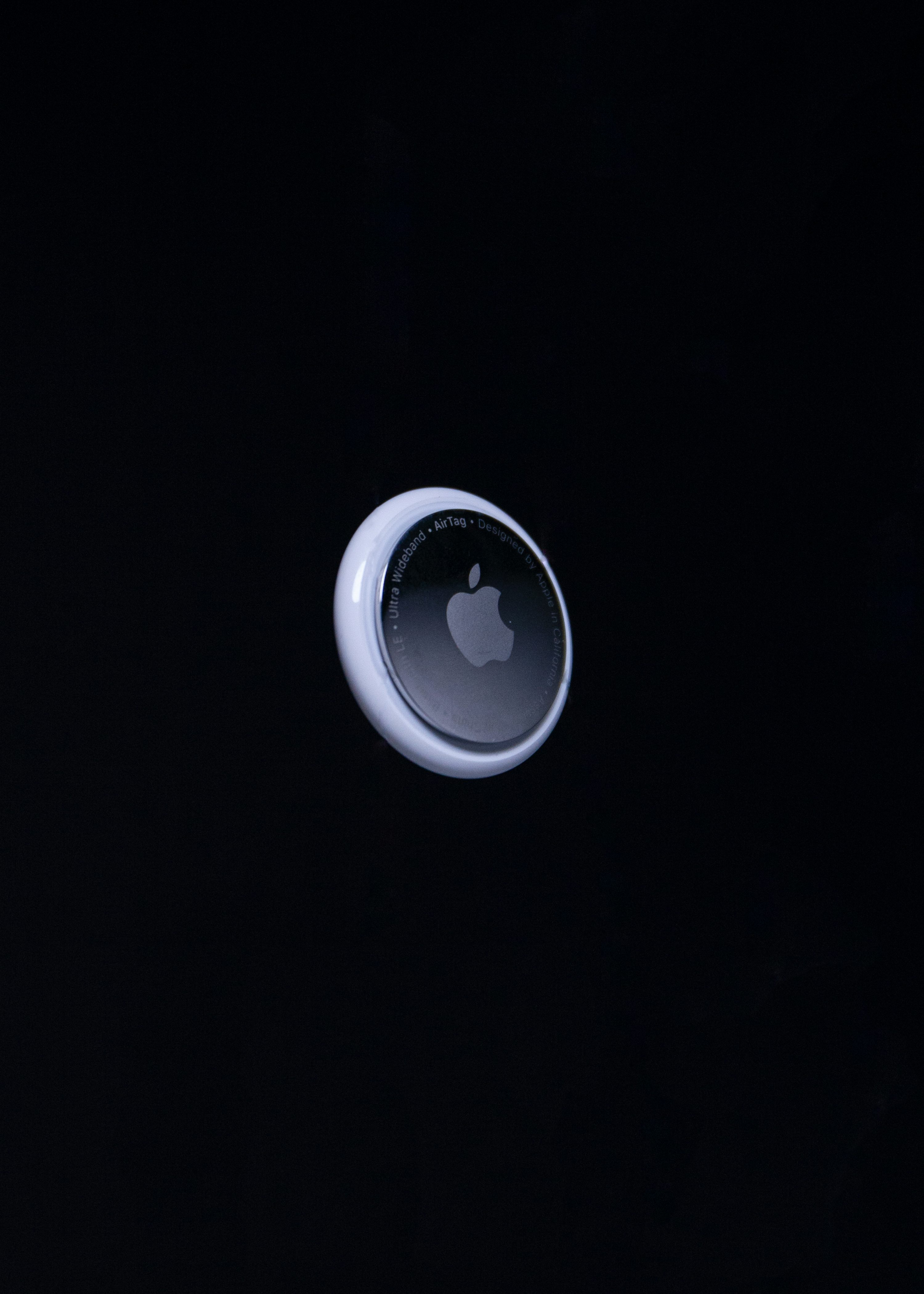 An apple logo is shown on a black background photo