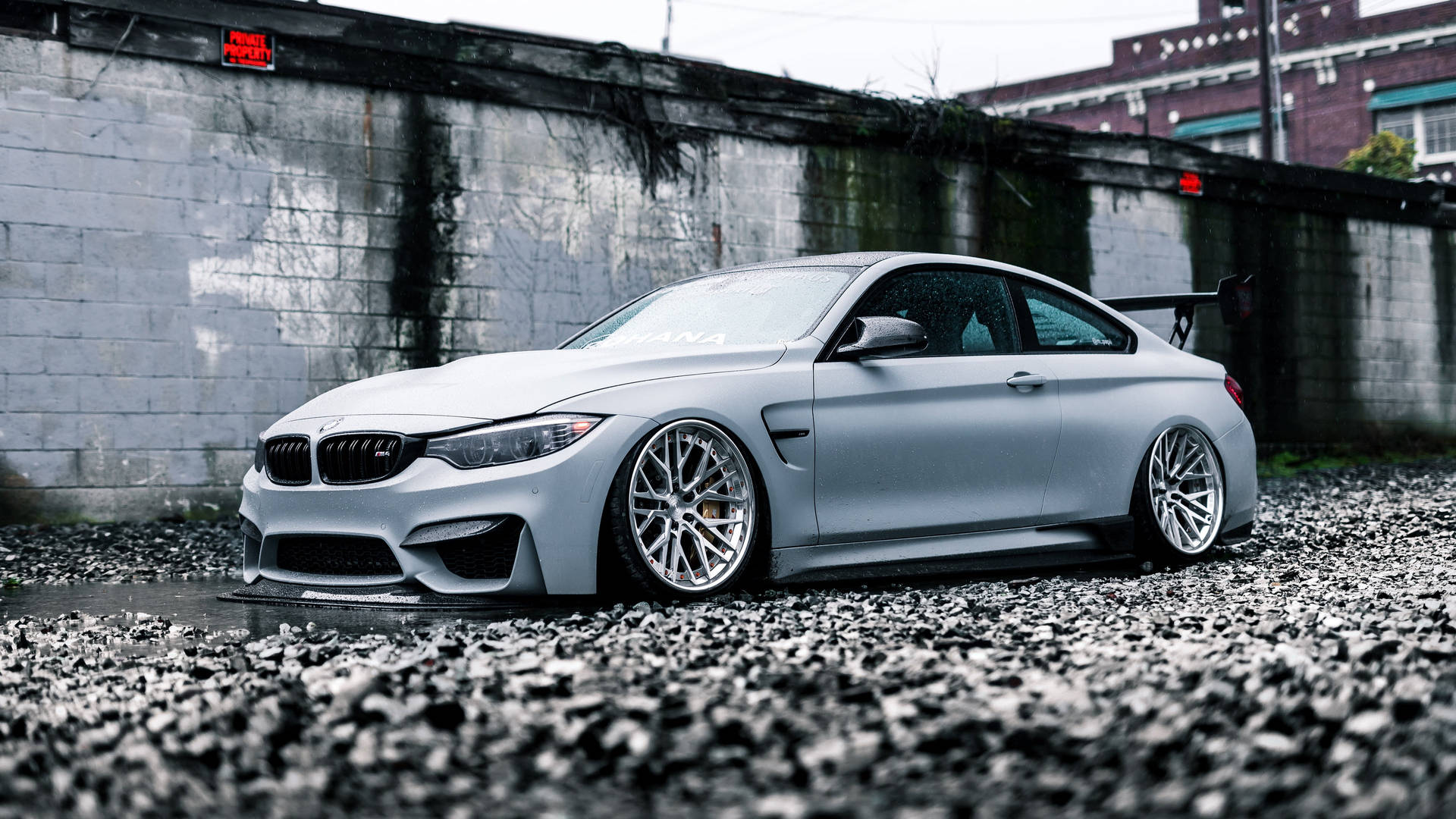 Download White Bmw M4 Stony Ground Wallpaper