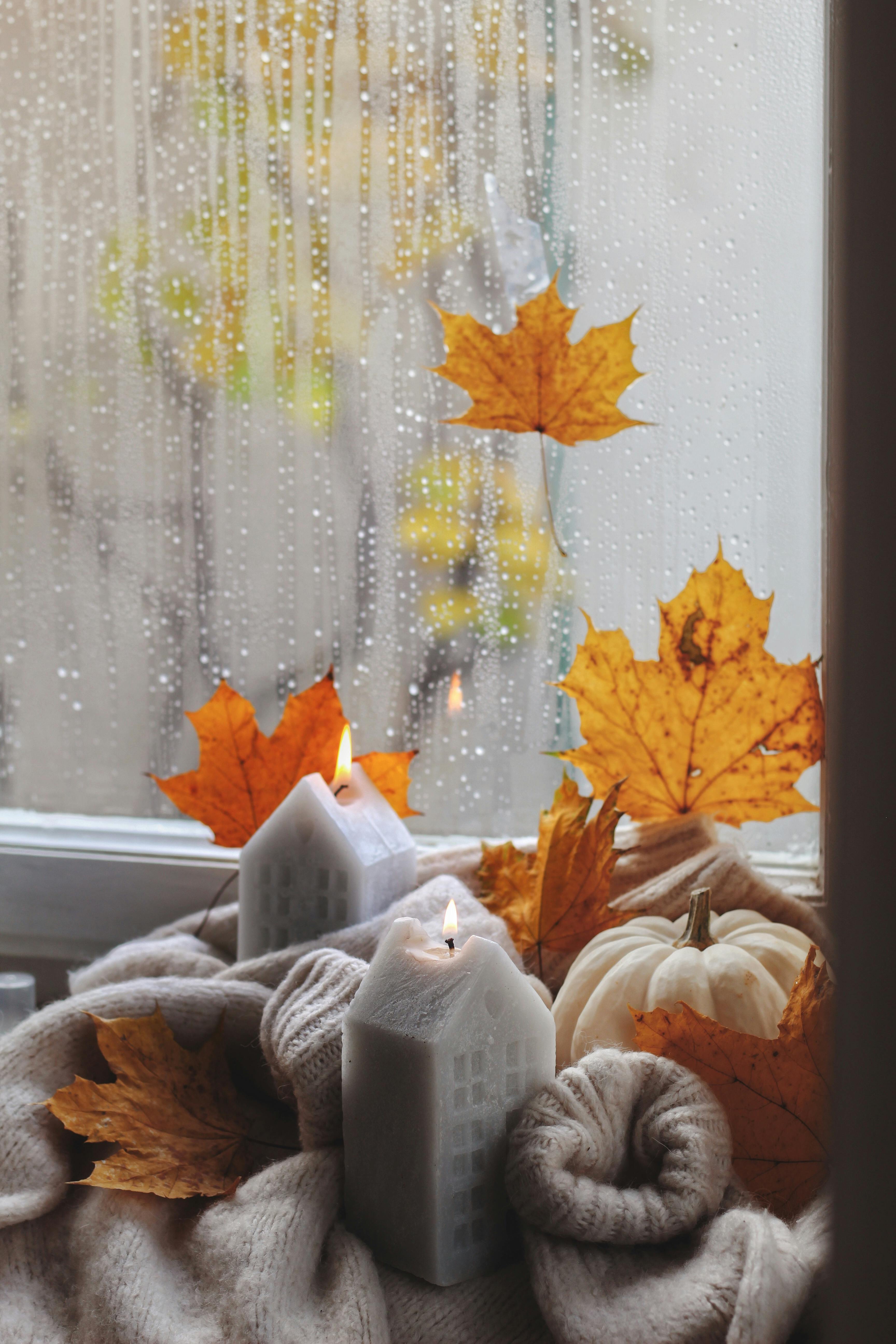Autumn Leaves and Candles on Windowsill · Free