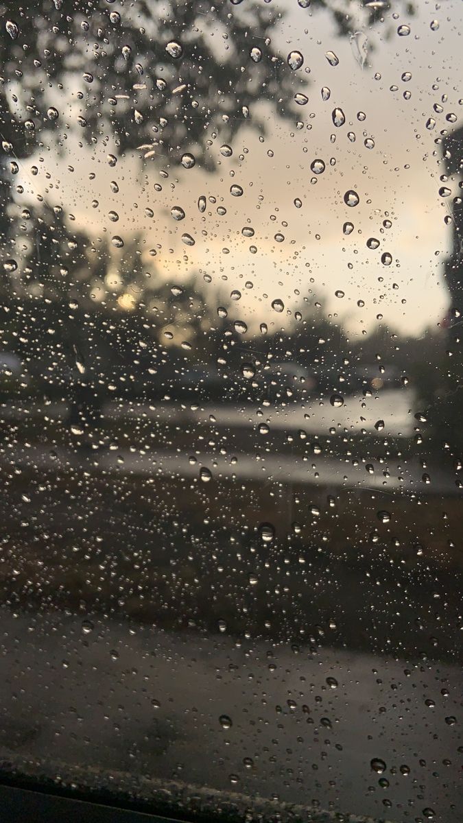 Rain Falling on Window Outside