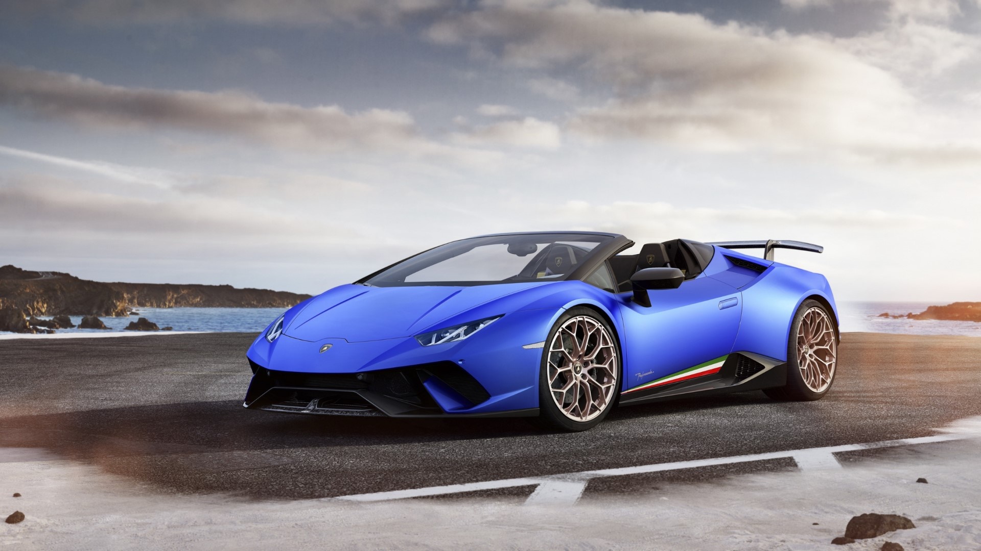 Sleek Blue Lamborghini Huracan Performante Spyder0 Sports Car Dominates Coastal Road