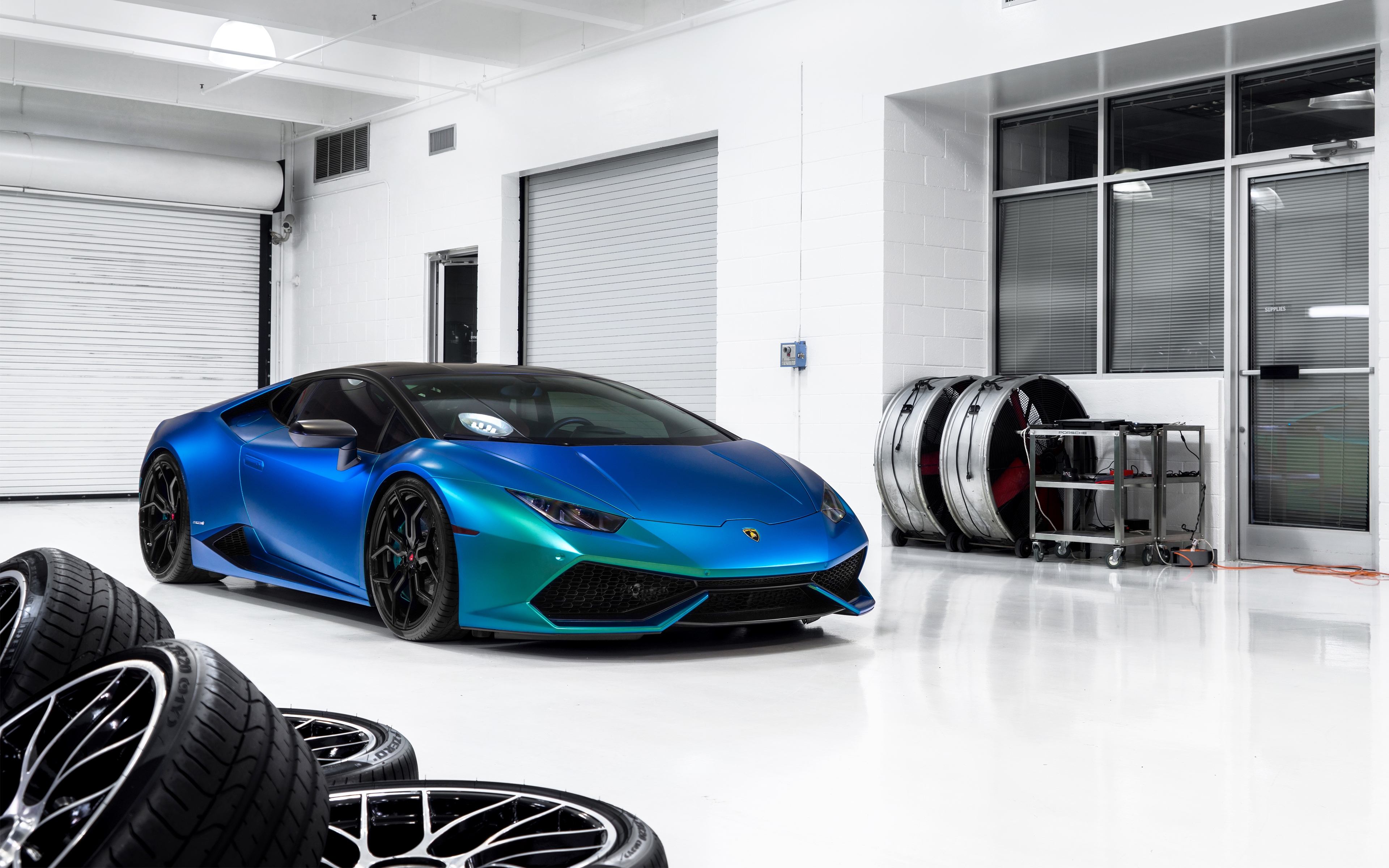 Blue Lamborghini Huracan Standing In A Light Colored Garage · 1024x768 Free Photo From Godlike And Wallpaper