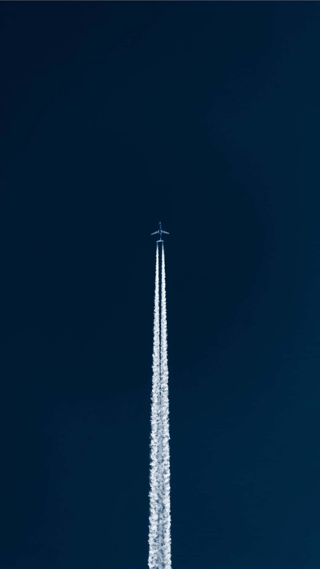 Download Jet Contrail Against Blue Sky Wallpaper