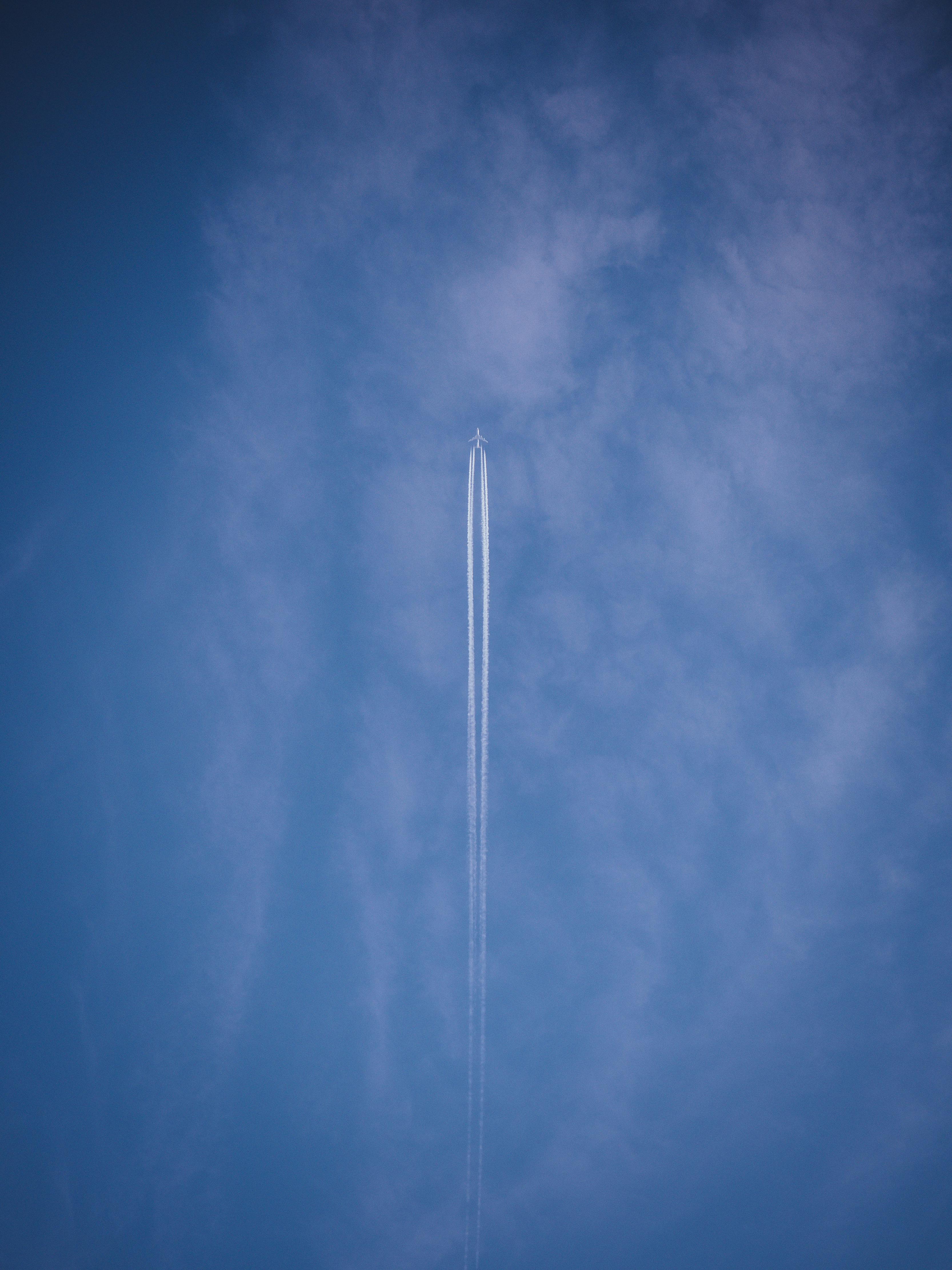 Contrail of an Airplane on Blue Sky · Free