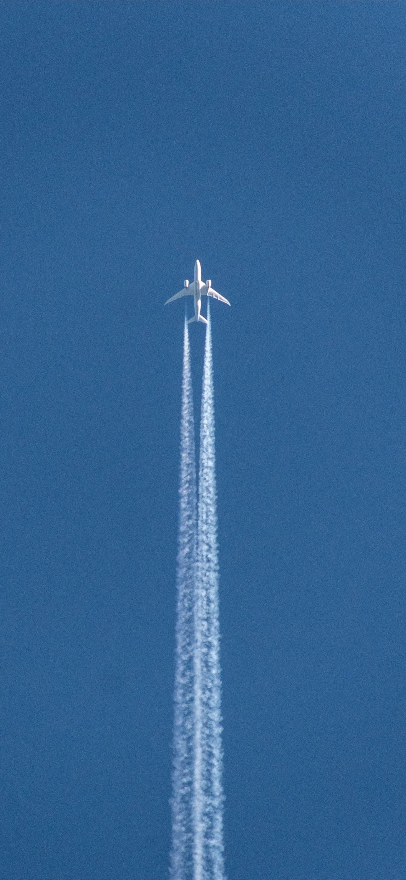 plane doing contrail show iPhone Wallpaper Free Download