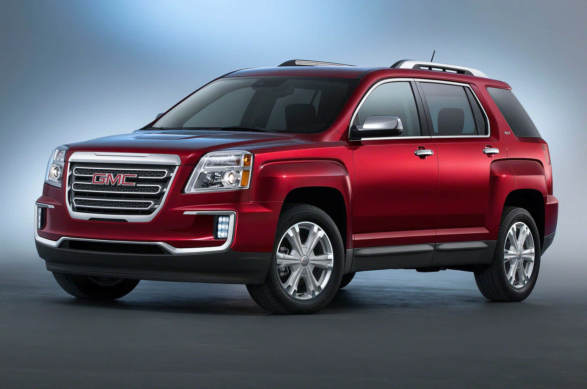 Download Sleek silver GMC Terrain on an open road Wallpaper