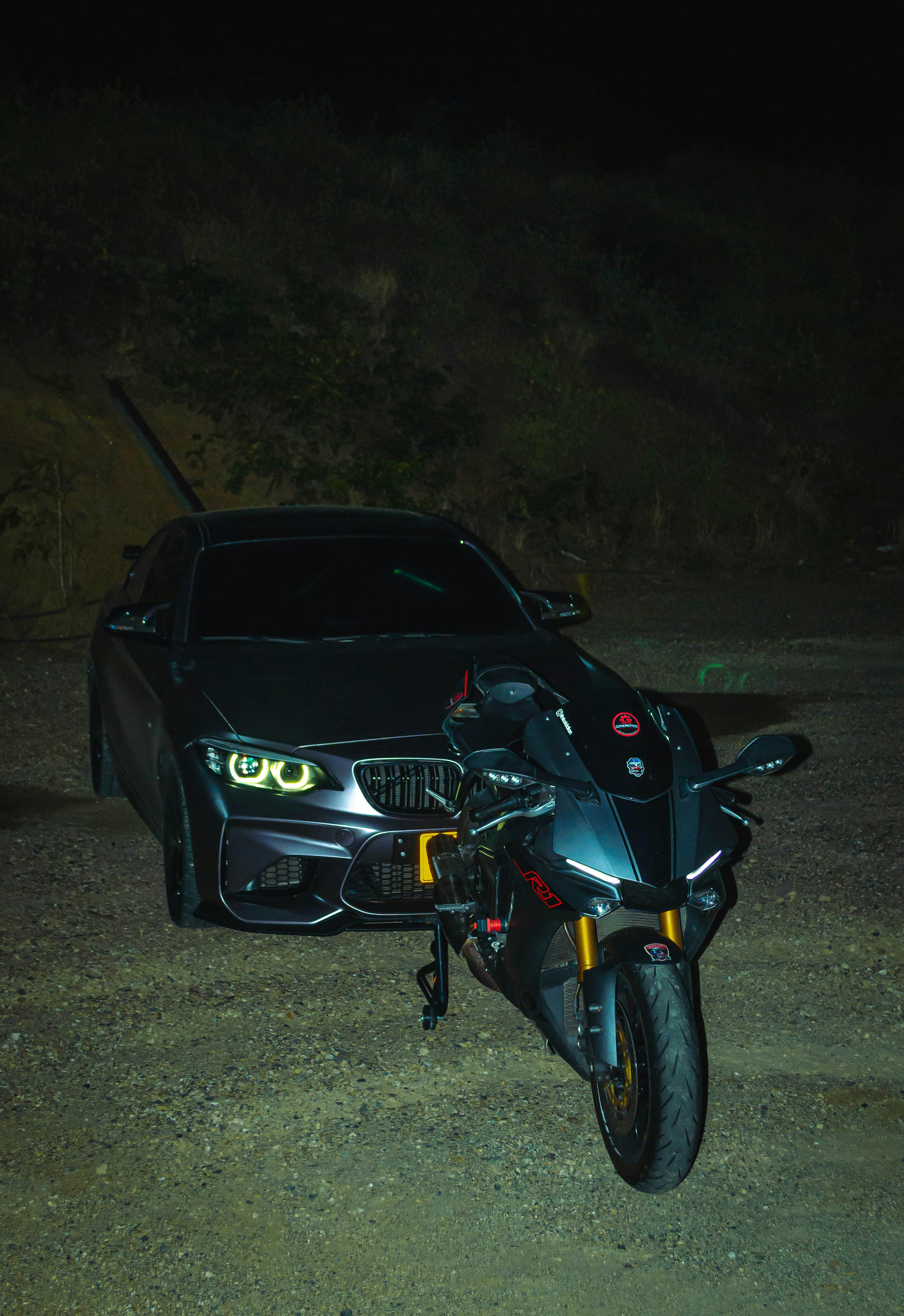 Sports BMW Car and Yamaha Motorbike at Night · Free
