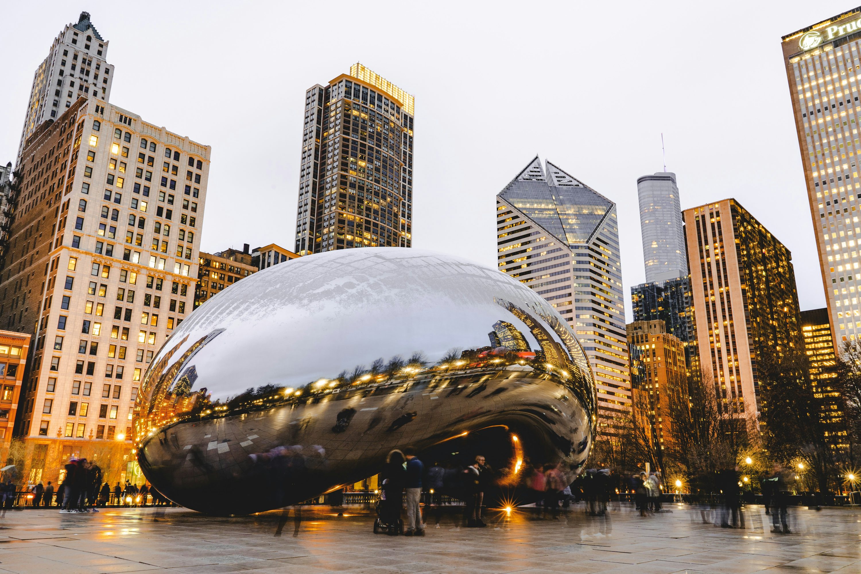 People standing near Cloud Gate during daytime photo