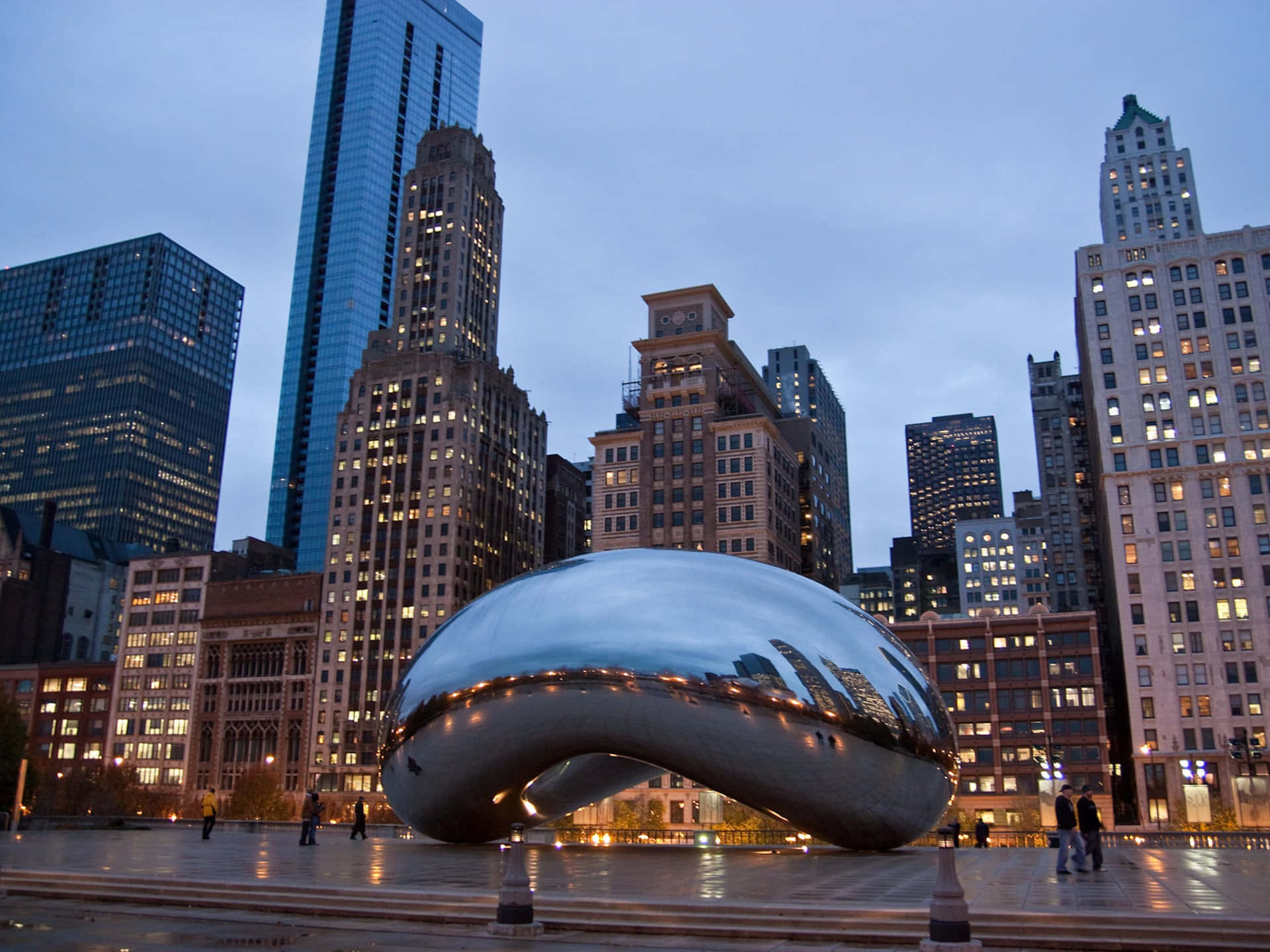 Download Cloud Gate And The City Lights Of Chicago Wallpaper