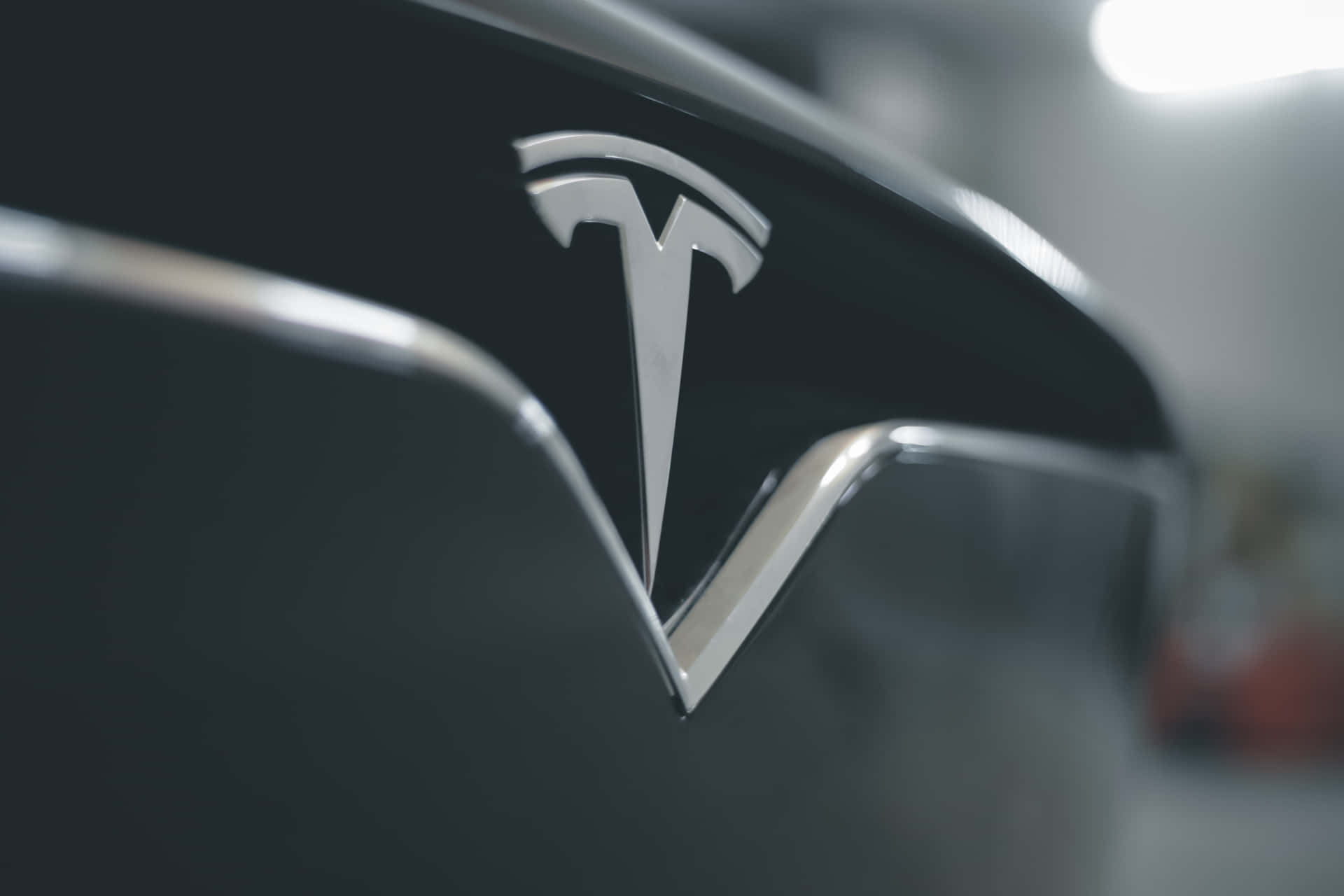 Download Logo of the technological automobile company Tesla in 4k resolution Wallpaper
