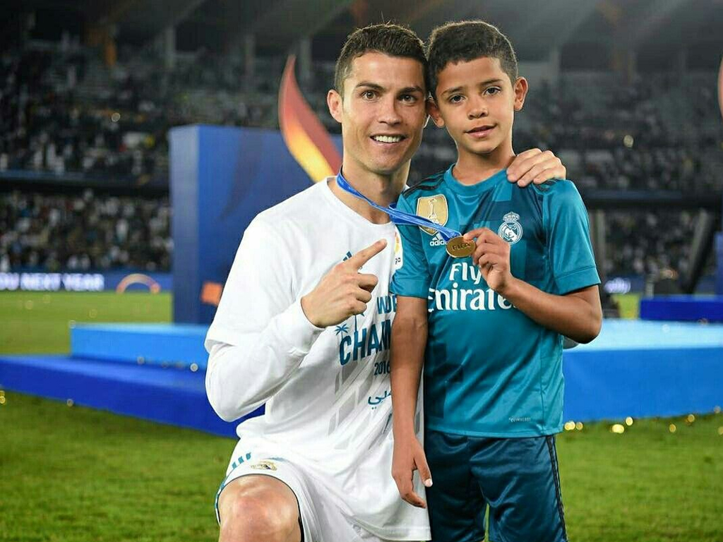 Like father, like son: Cristiano Jr shows off his skills in front of daddy