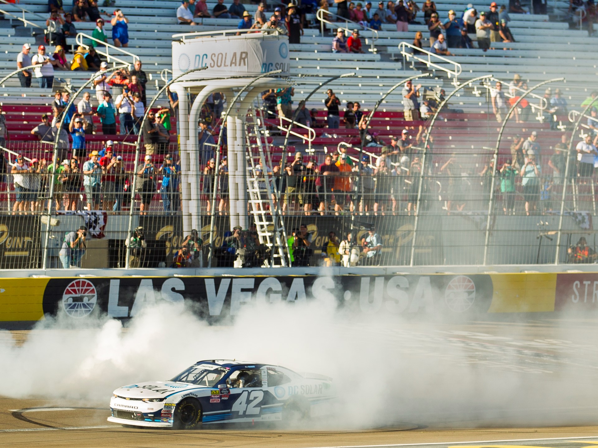 Ross Chastain does a burnout at the finish line after winning the NASCAR Xfinity Series