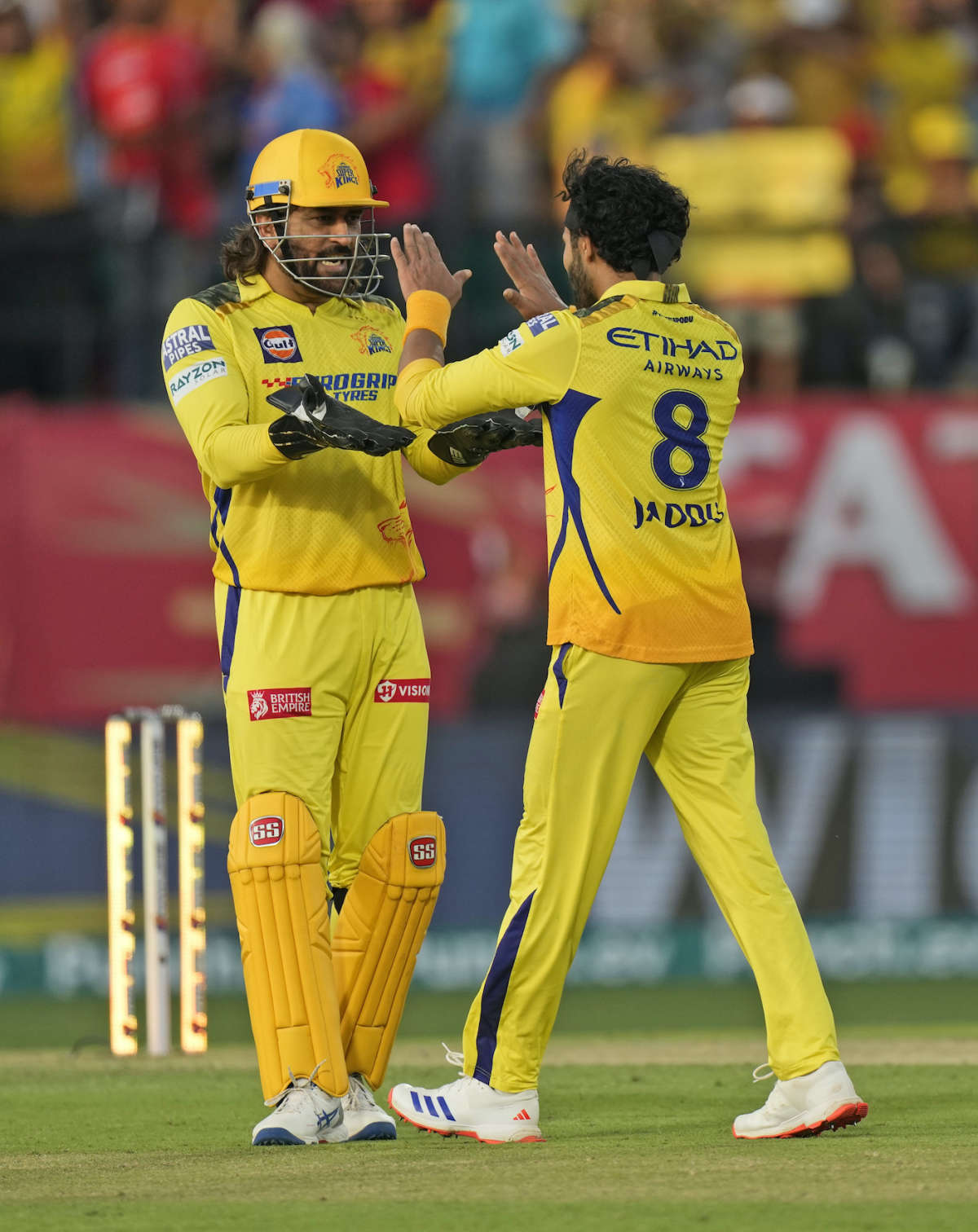 MS Dhoni celebrates with Ravindra Jadeja