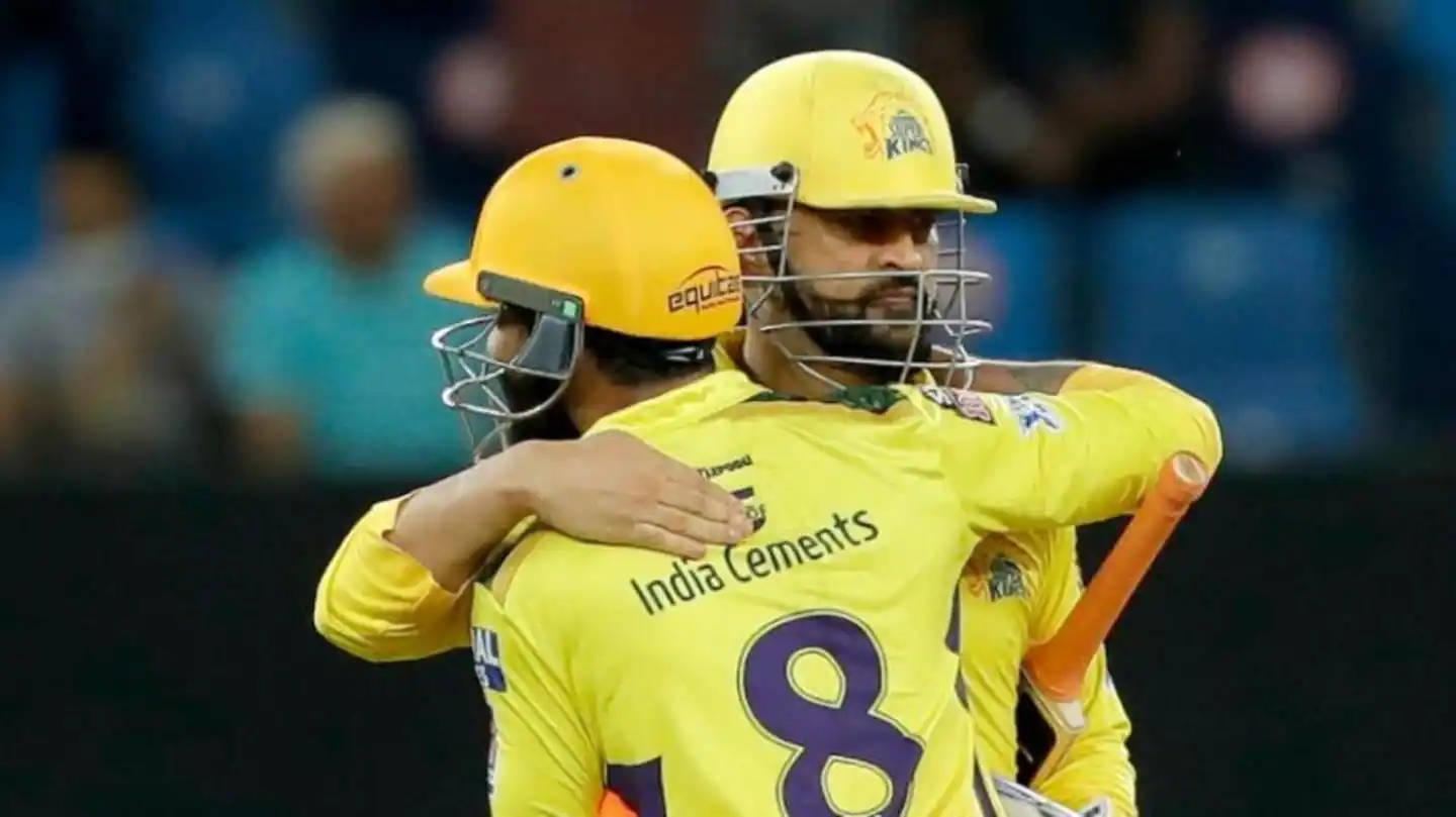 Download Dhoni 7 And Jadeja 8 Hug Together Wallpaper