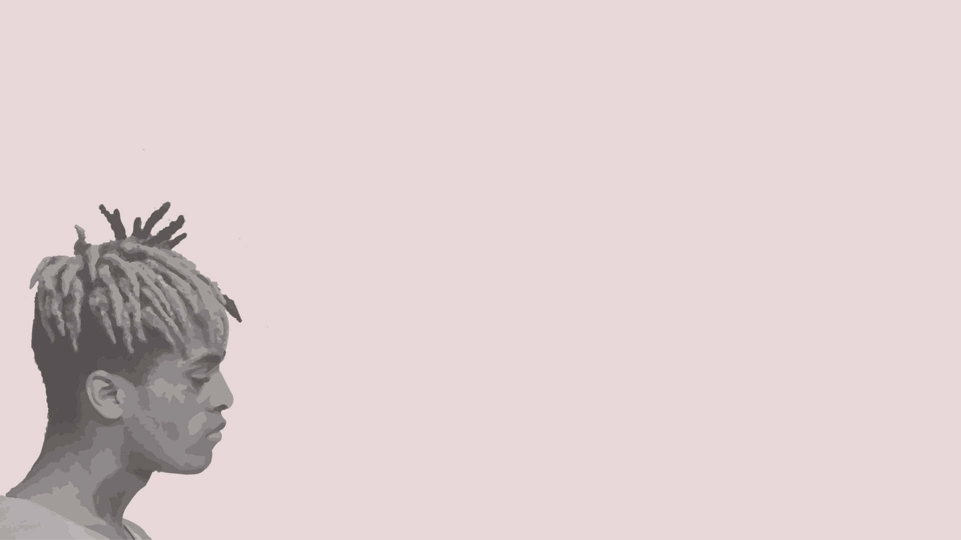 Download XXXTENTACION in front of a computer Wallpaper
