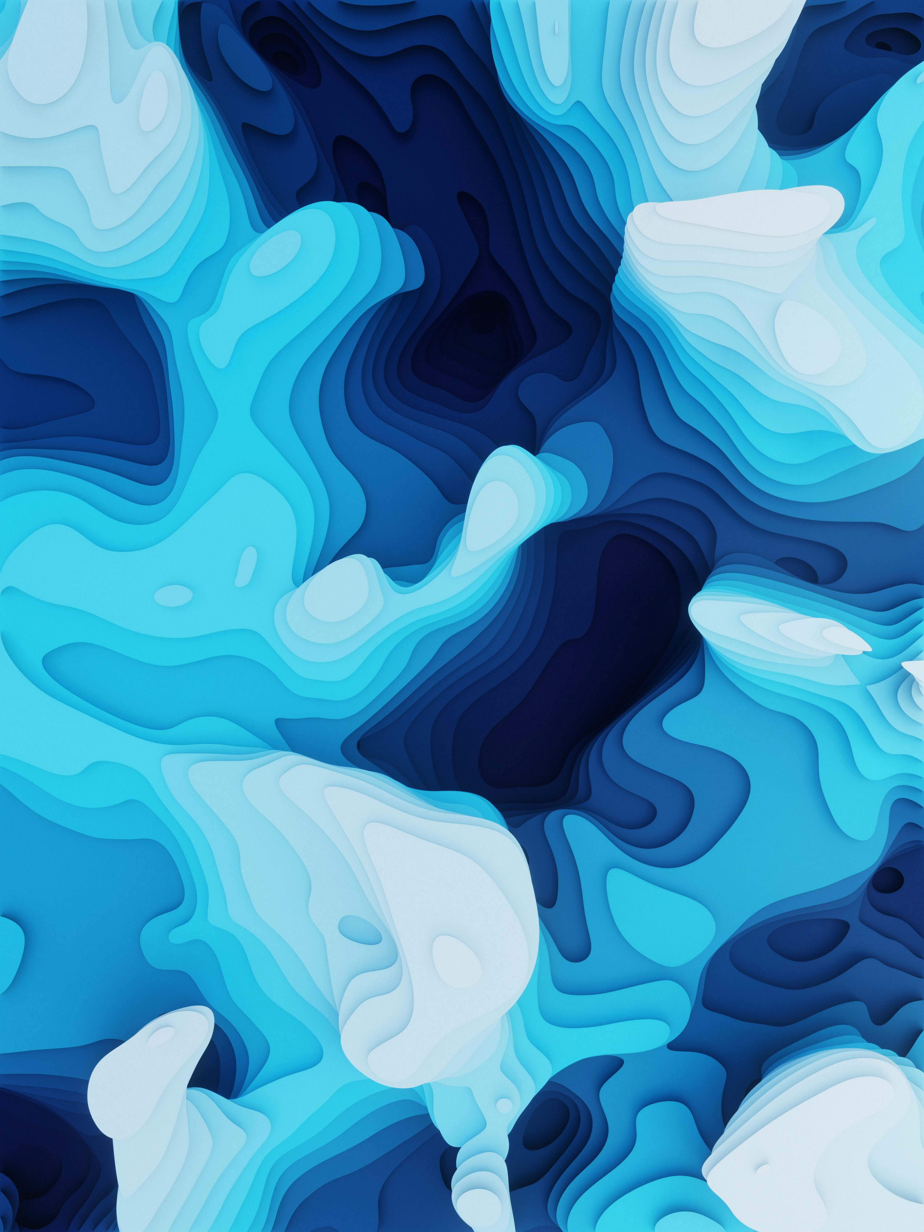 A blue and white abstract background with wavy shapes photo