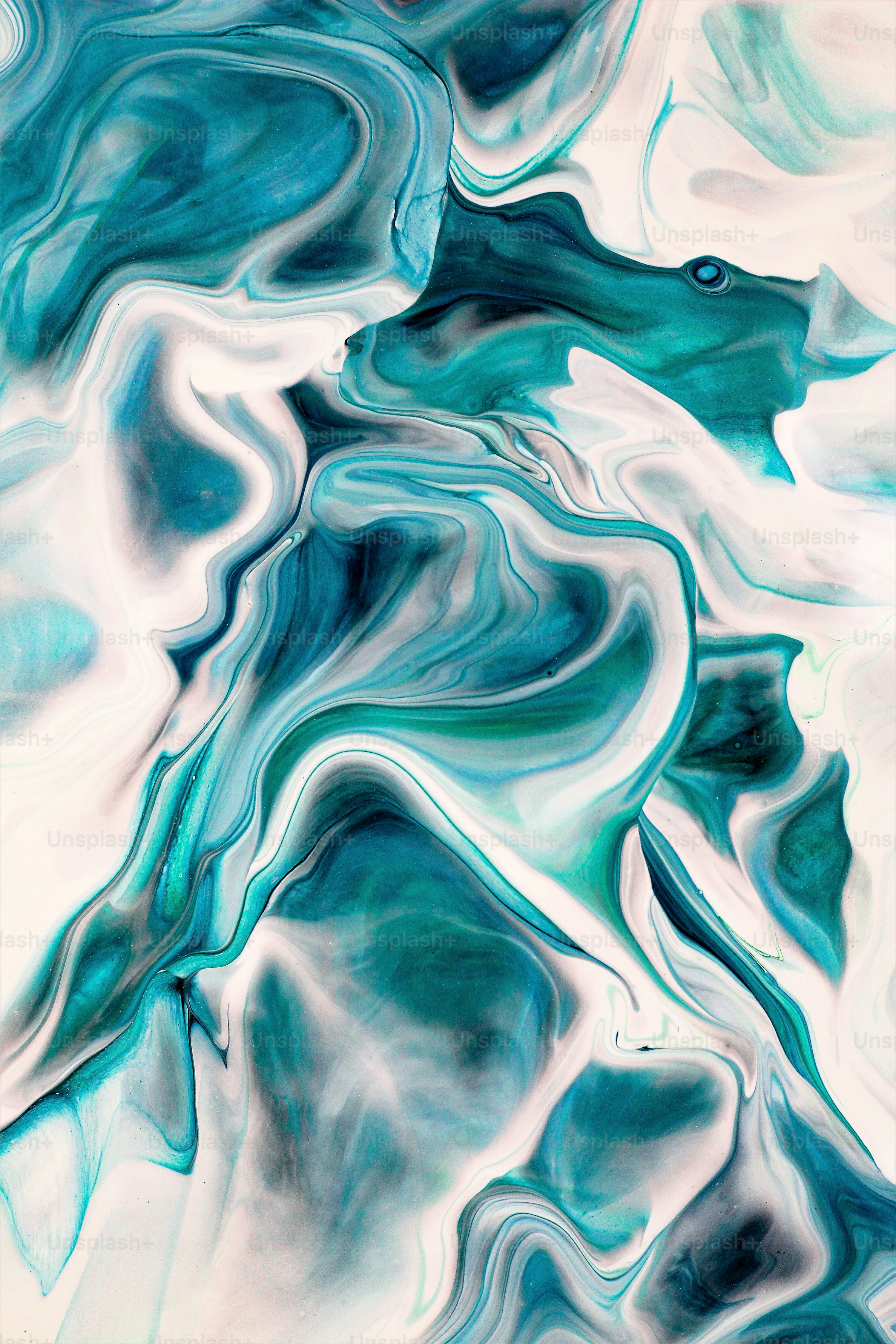 An abstract painting with blue and white colors photo