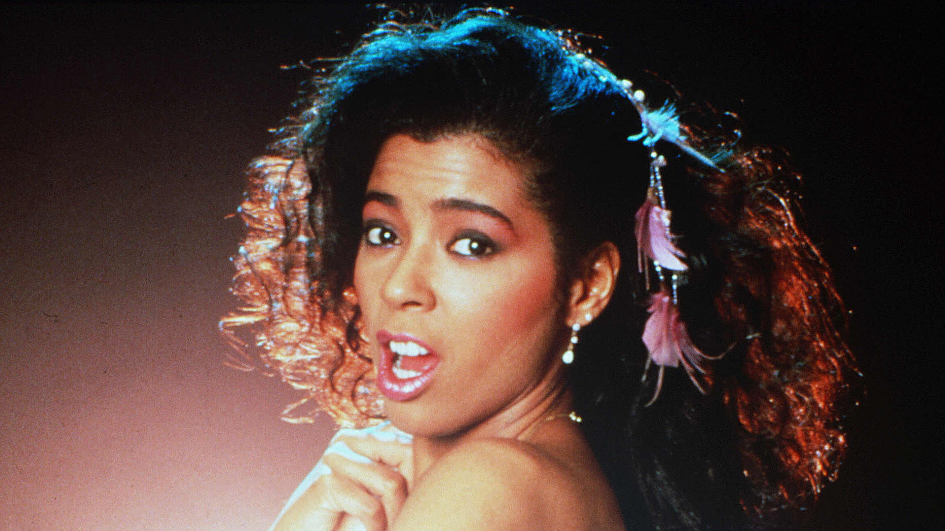 Inside Irene Cara's rise to fame from growing up on 'rough NYC streets' to pageant beauty queen and Flashdance starlet