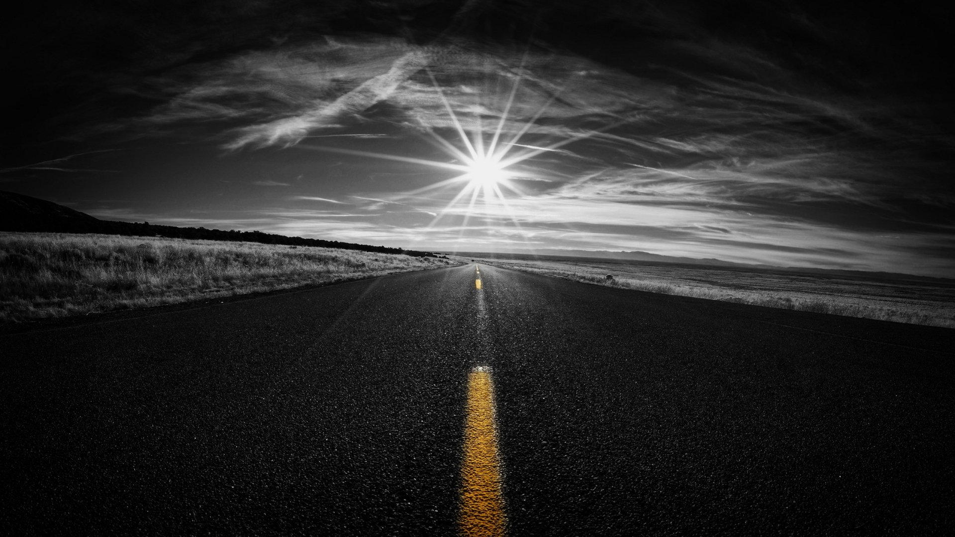 Sunbeam Horizon on a Black & White Road Selective Color Wallpaper