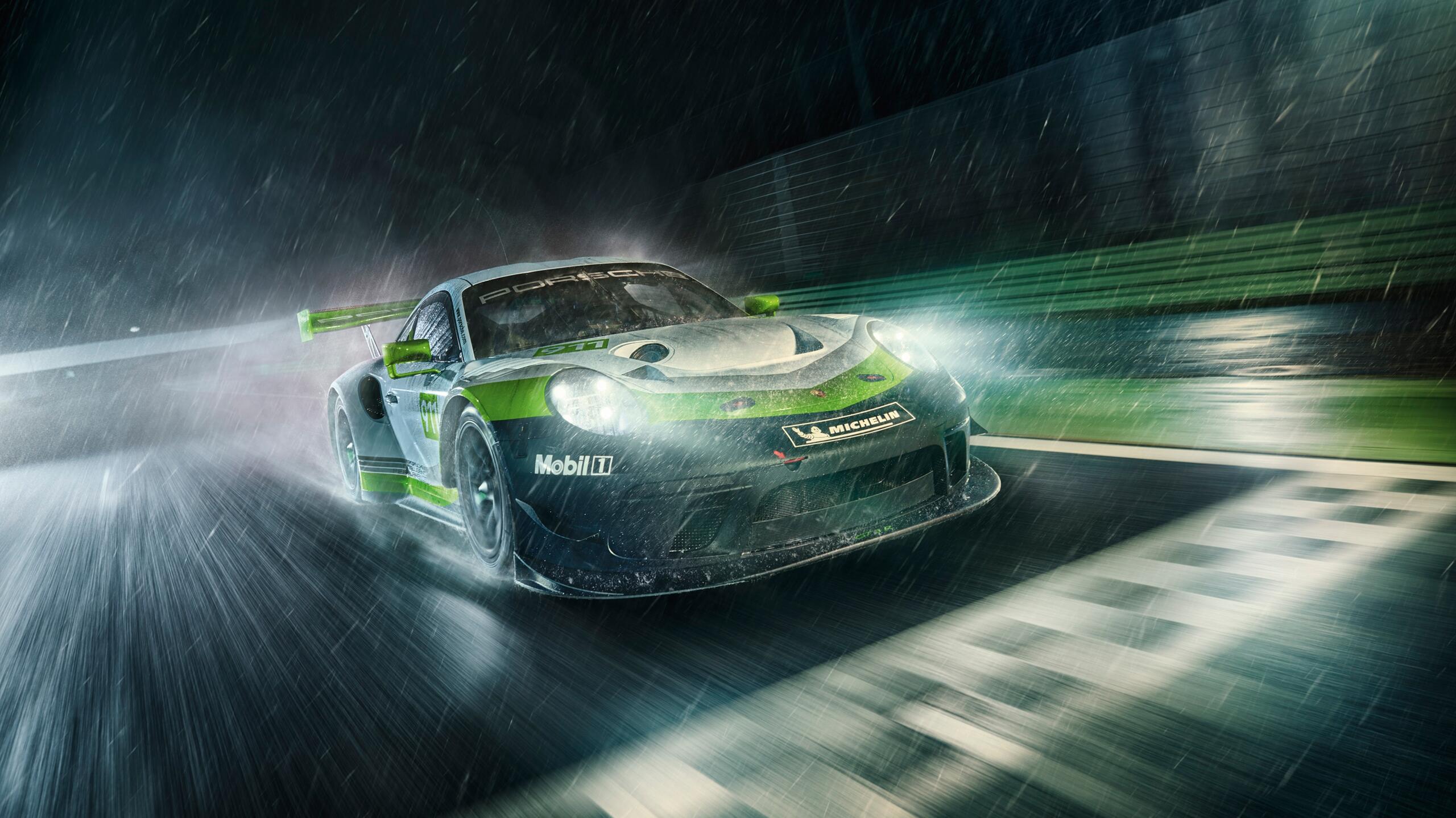 The Porsche 911 Gt3 R drives on a rainy road at night. · 2560x1440 QHD & WQHD (16:9) free photo from jorik and wallpaper