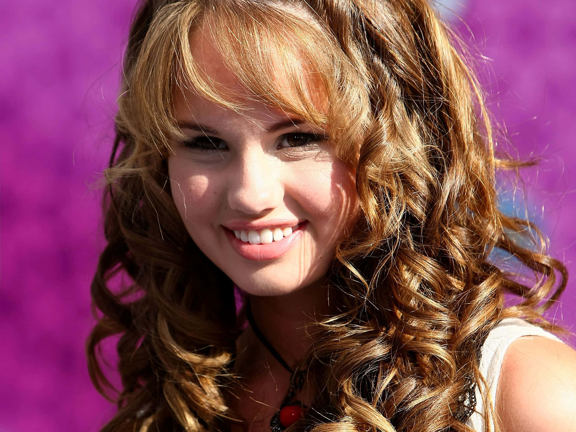 Download Radiant Teenager with Curls Wallpaper