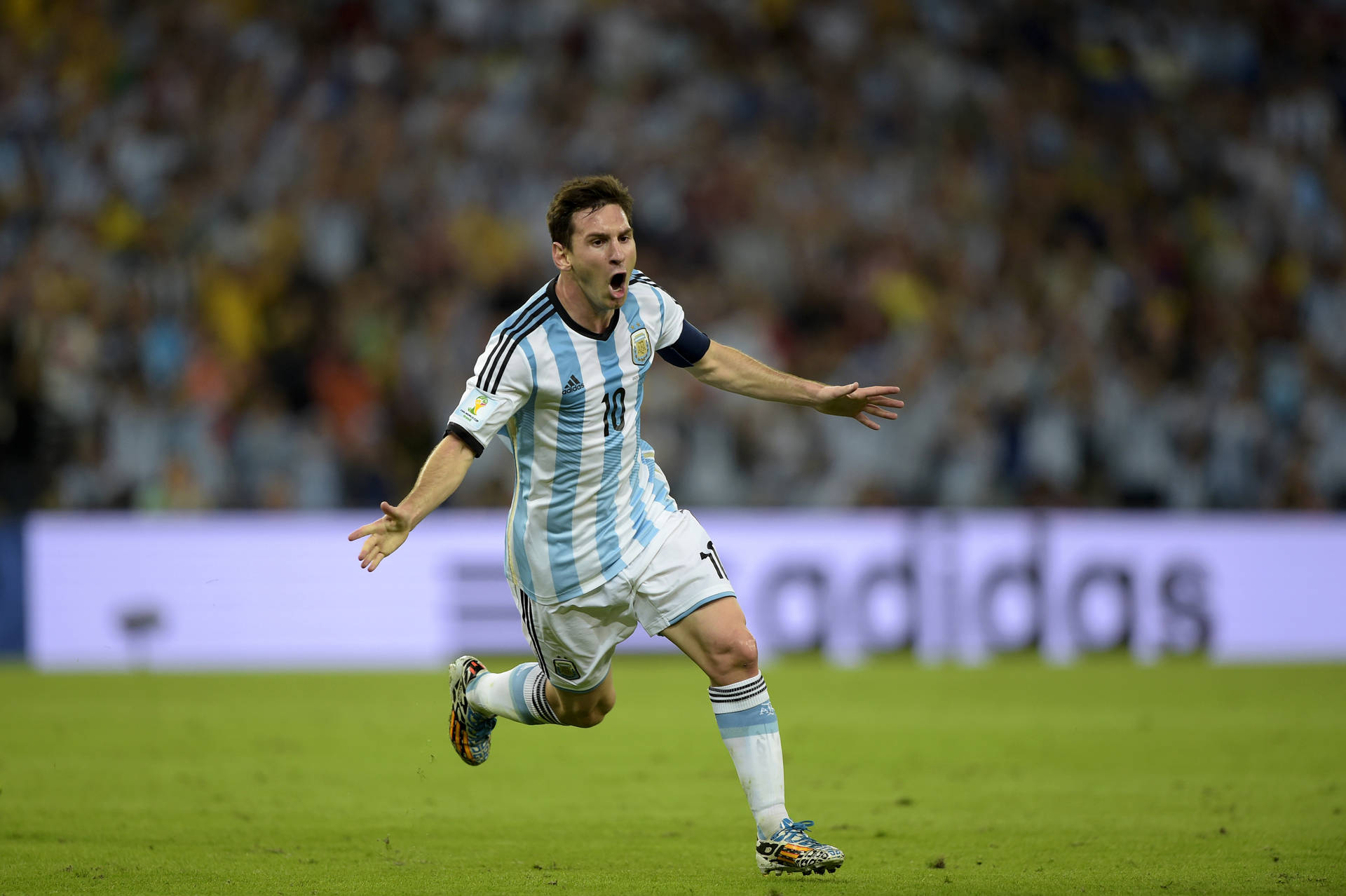 Download Elated Lionel Messi Running Wallpaper