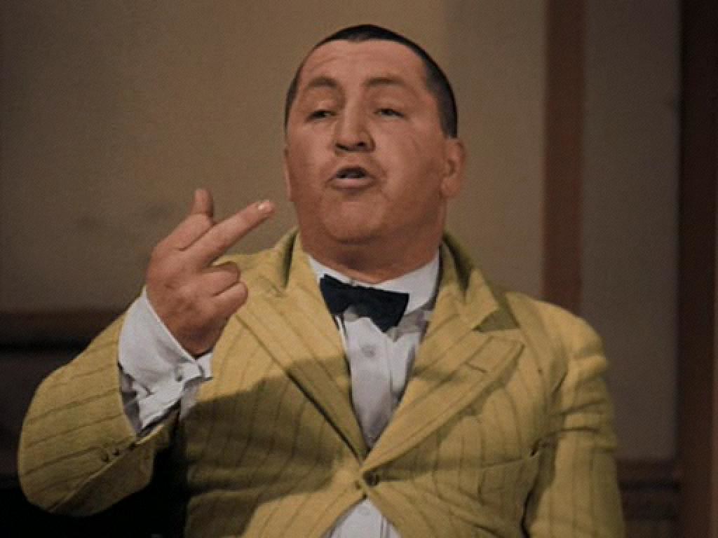 Curly Howard gives the bird. This is a still from the col