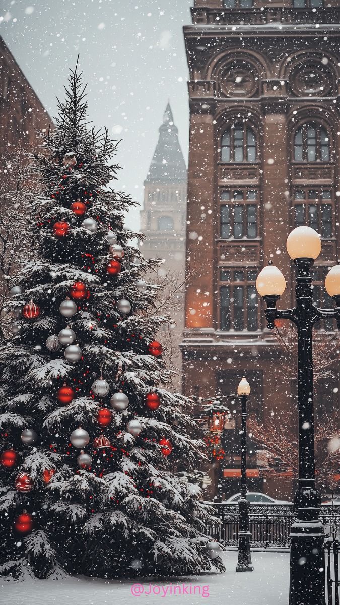 A Winter Wonderland: A Majestic Christmas Tree Stands Tall Amidst Falling Snow