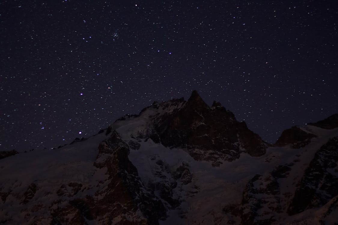 Photo of Mountain Under Starry Sky · Free