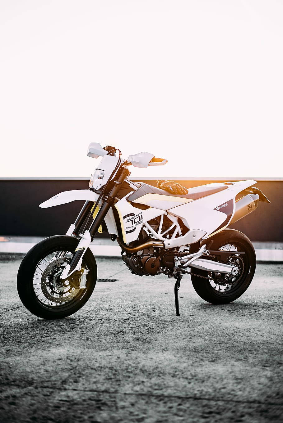 Download Thrilling Adventure with White Dirt Bike Wallpaper