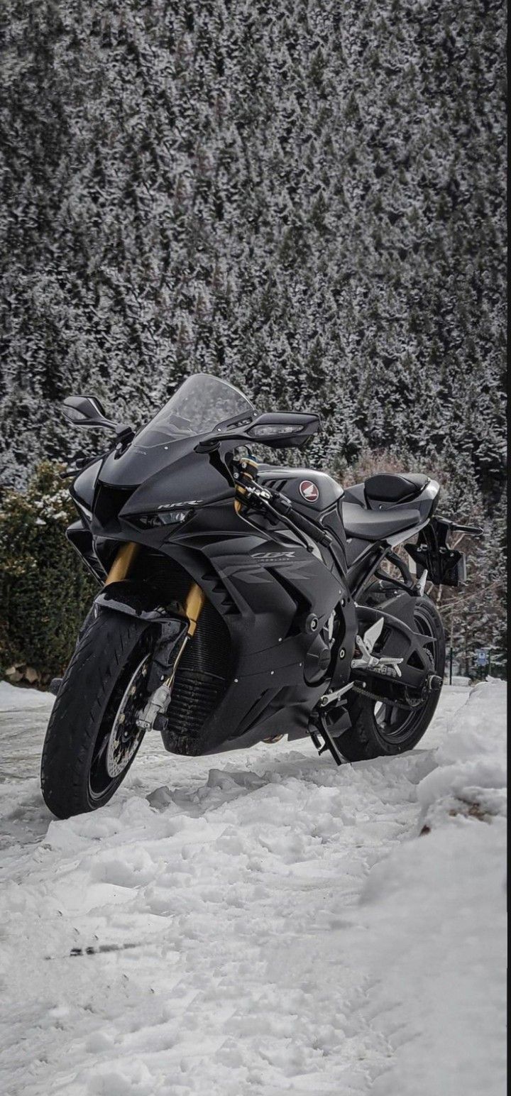 Motorcycle Parked on Snow Covered Ground