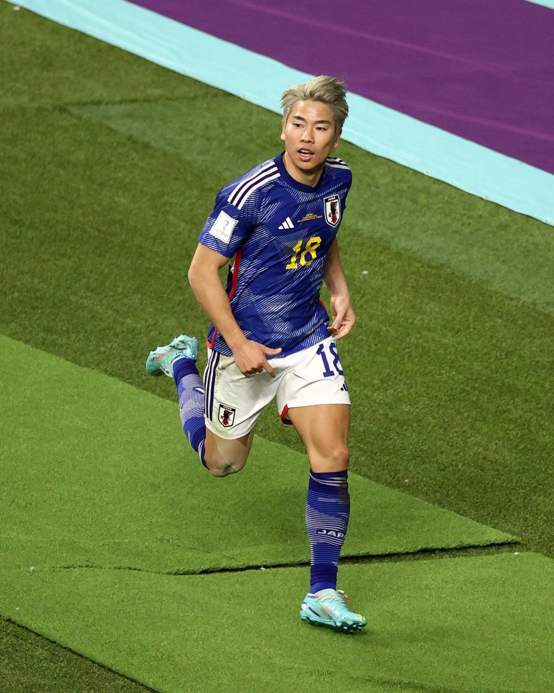 Download Japan National Football Team Running Takuma Asano Wallpaper