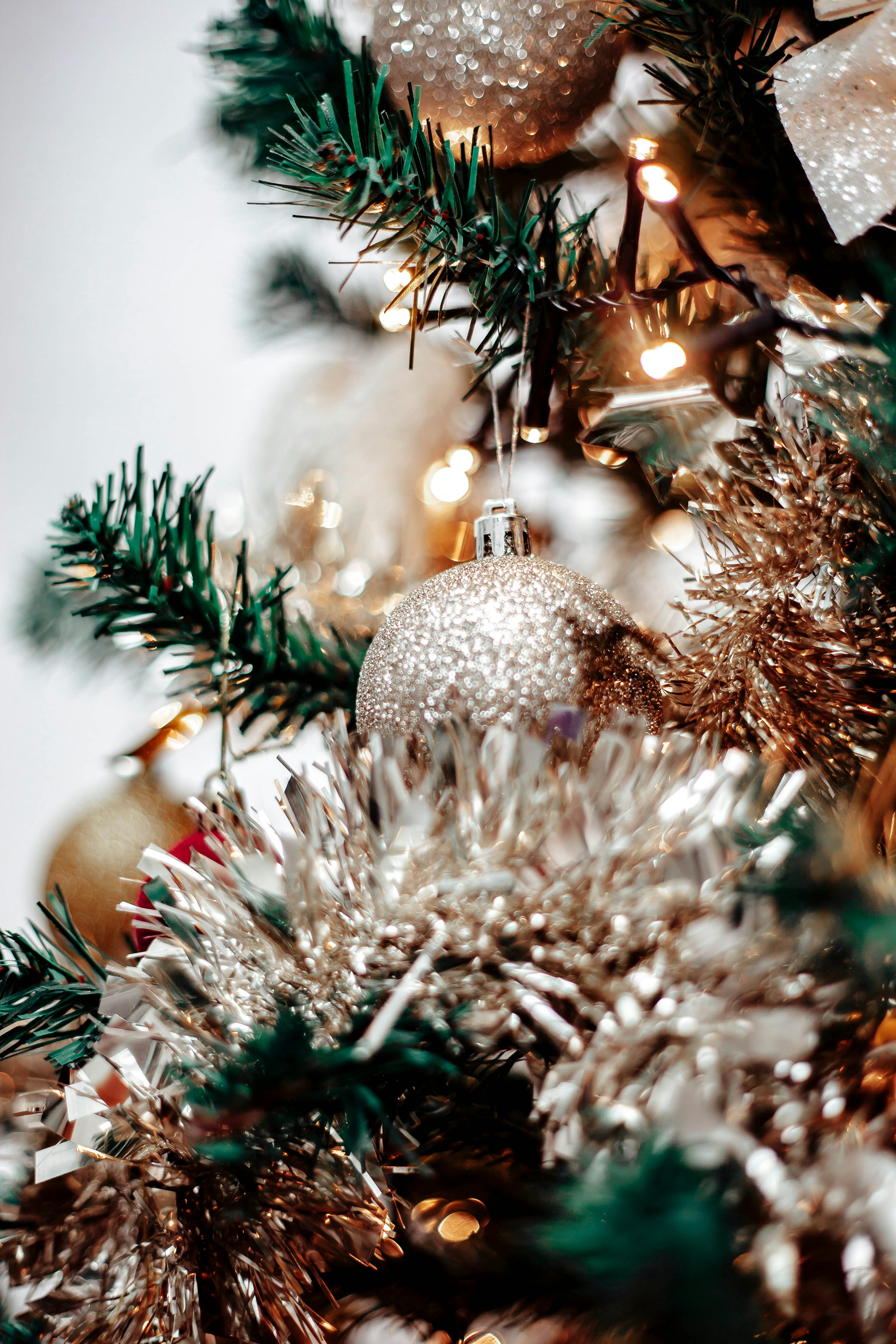 A close up of a christmas tree with ornaments photo