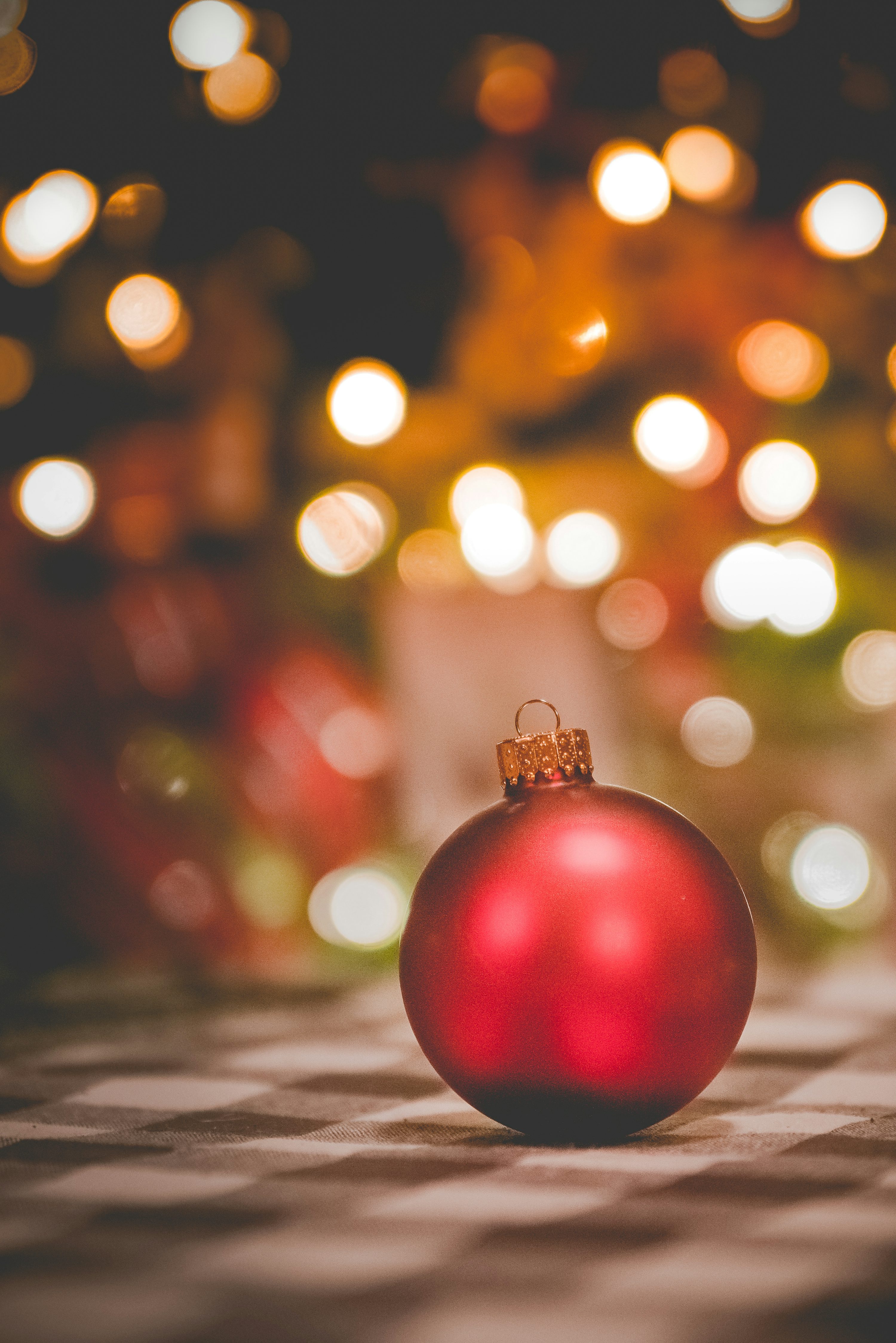 Selective focus photography of red Christmas bauble photo