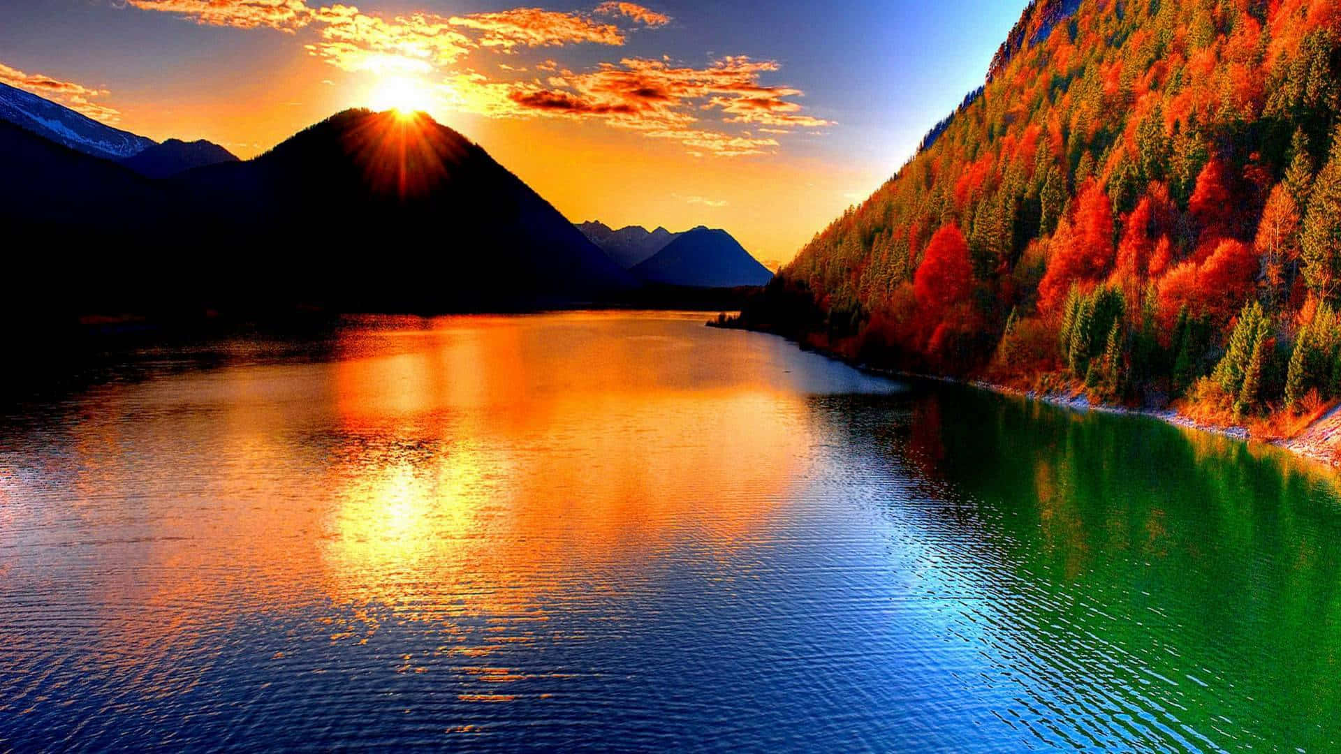 Download Majestic Sunset On Lake And Mountain Wallpaper