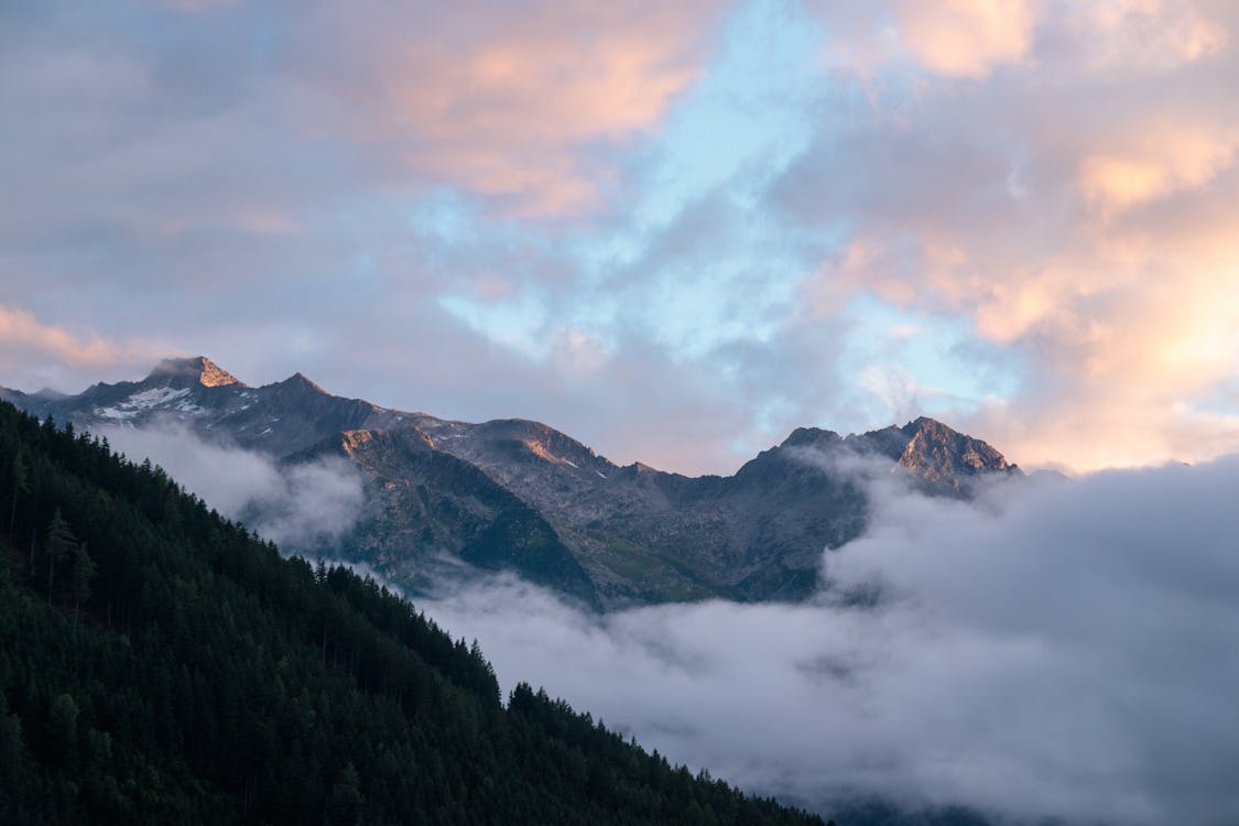 Majestic Mountain Range at Sunset · Free