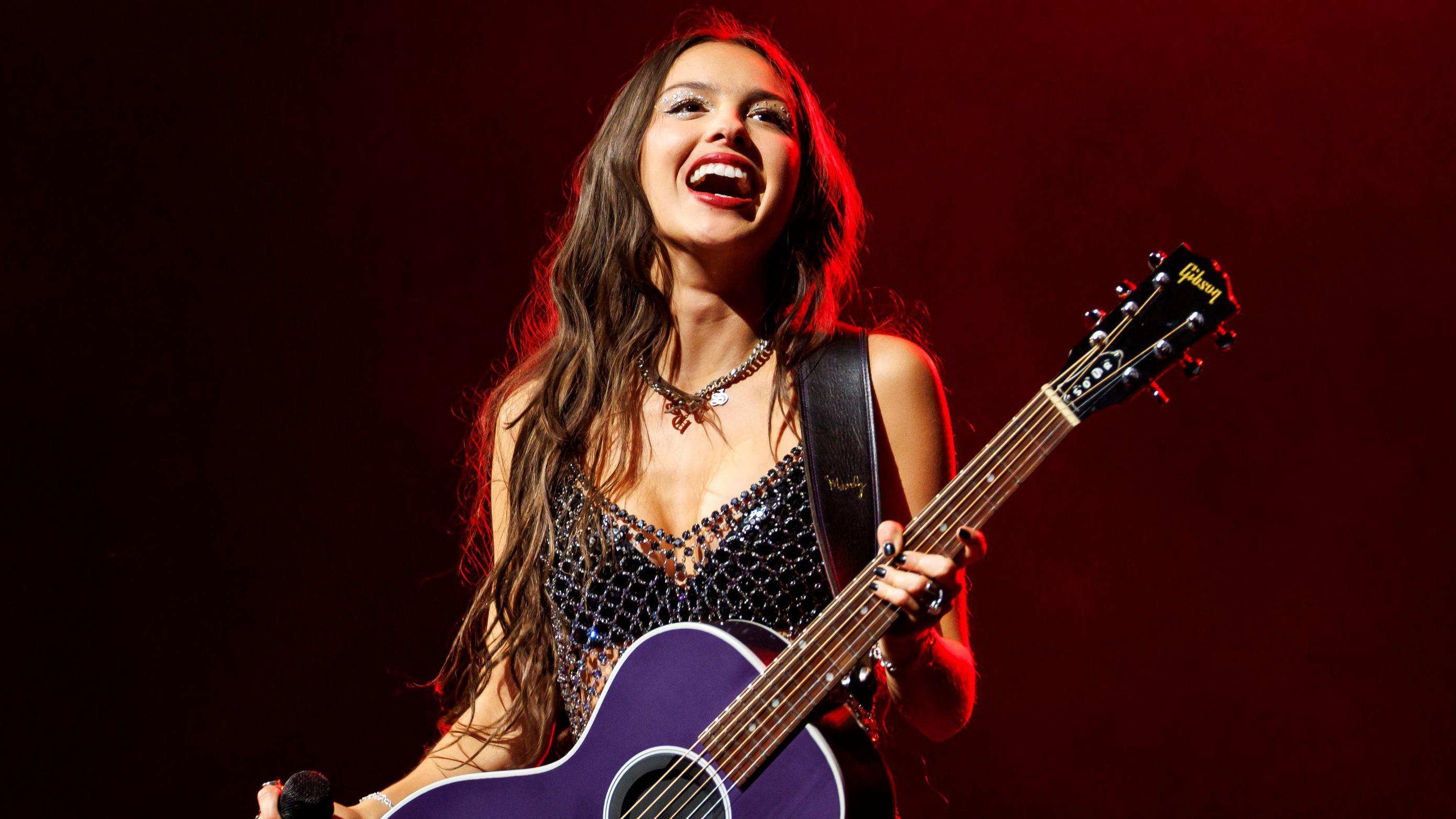 Olivia Rodrigo says she's OK after falling on stage in Melbourne