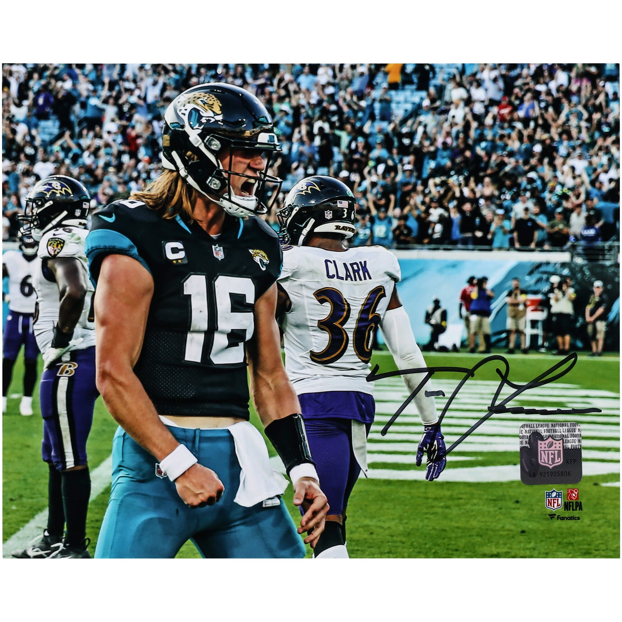 Trevor Lawrence Jacksonville Jaguars Autographed 8 x 10 In the Rain Photograph