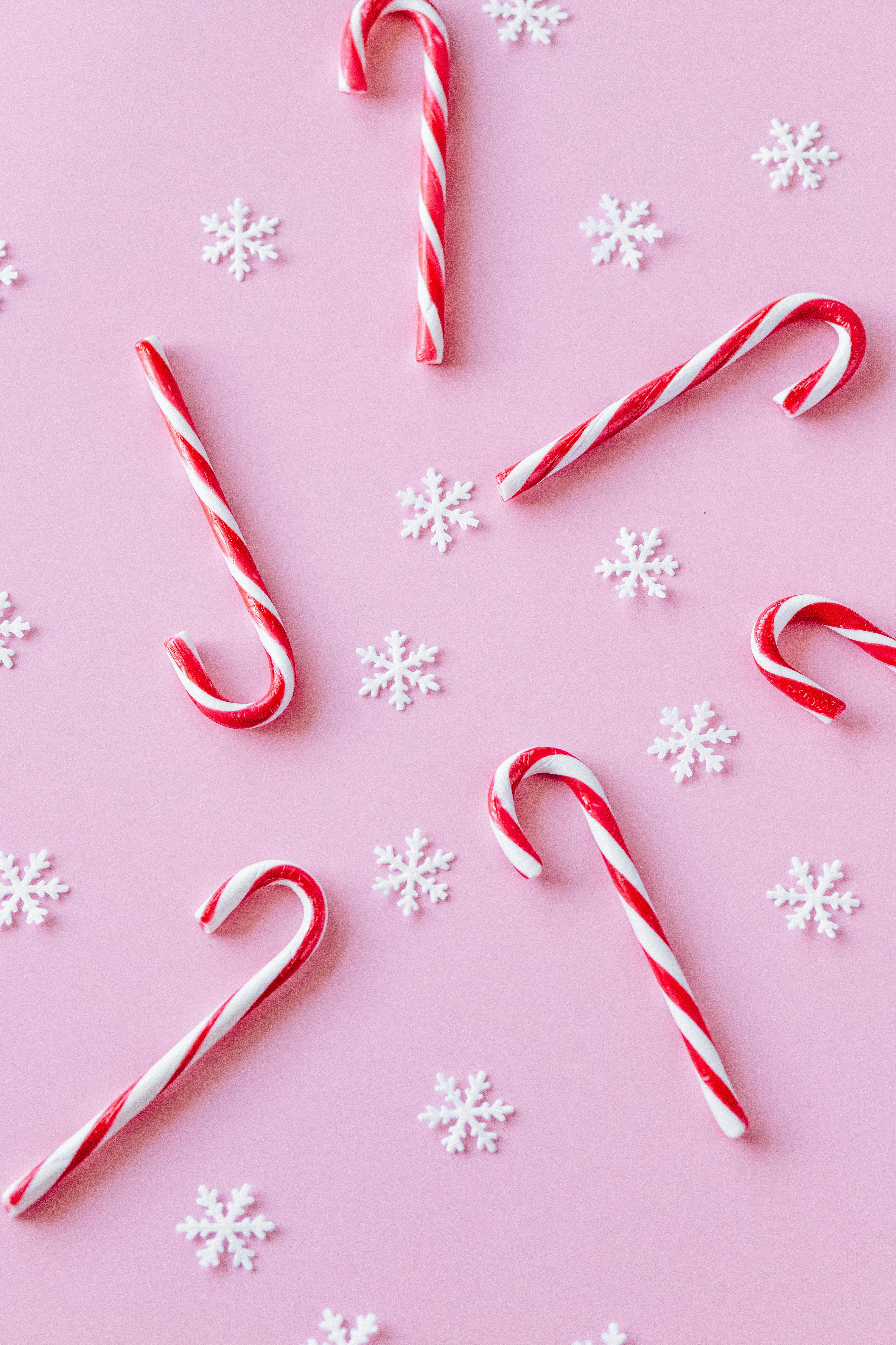 White and Red Candy Canes with Snowflakes · Free