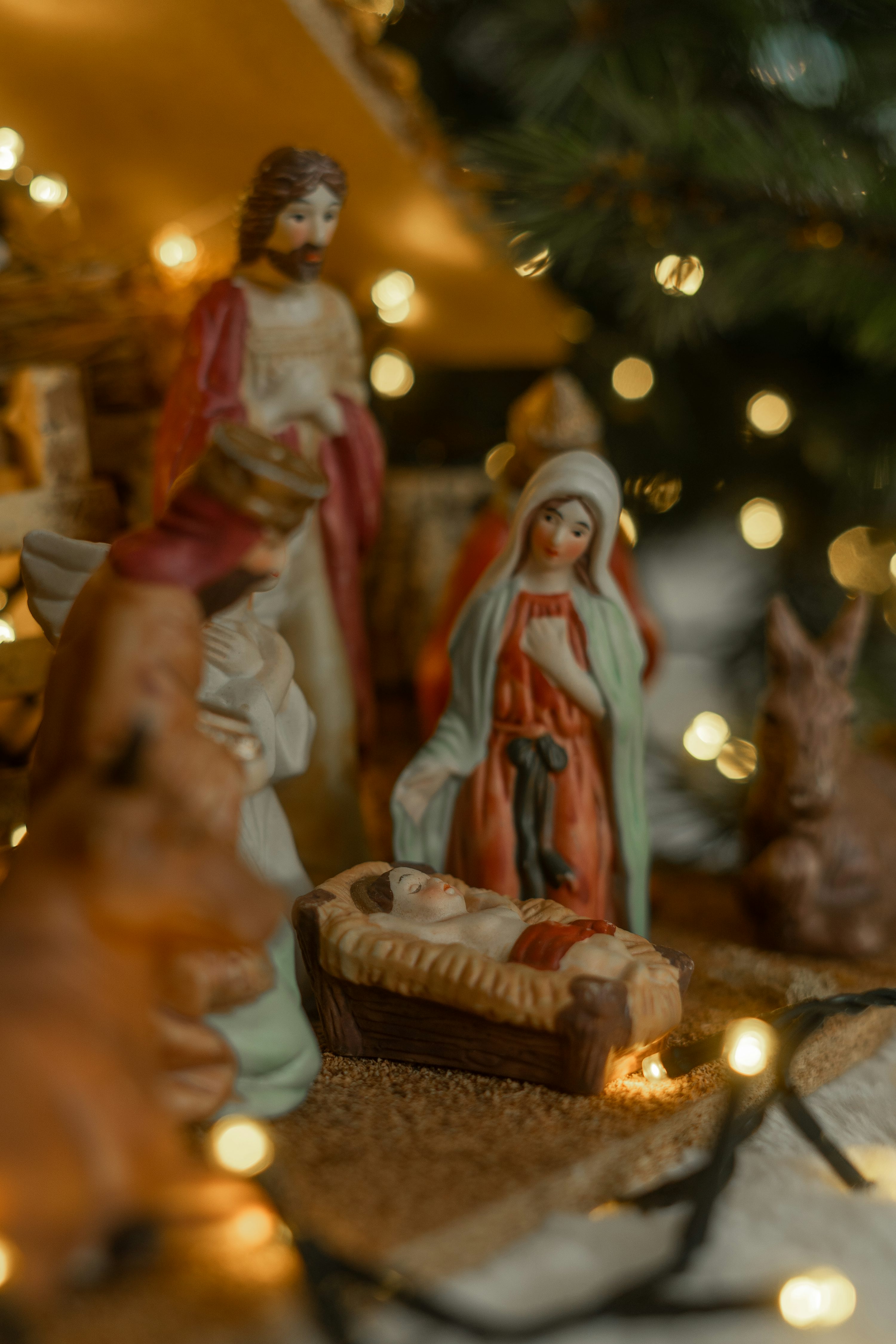 Nativity scene with baby jesus and figures photo