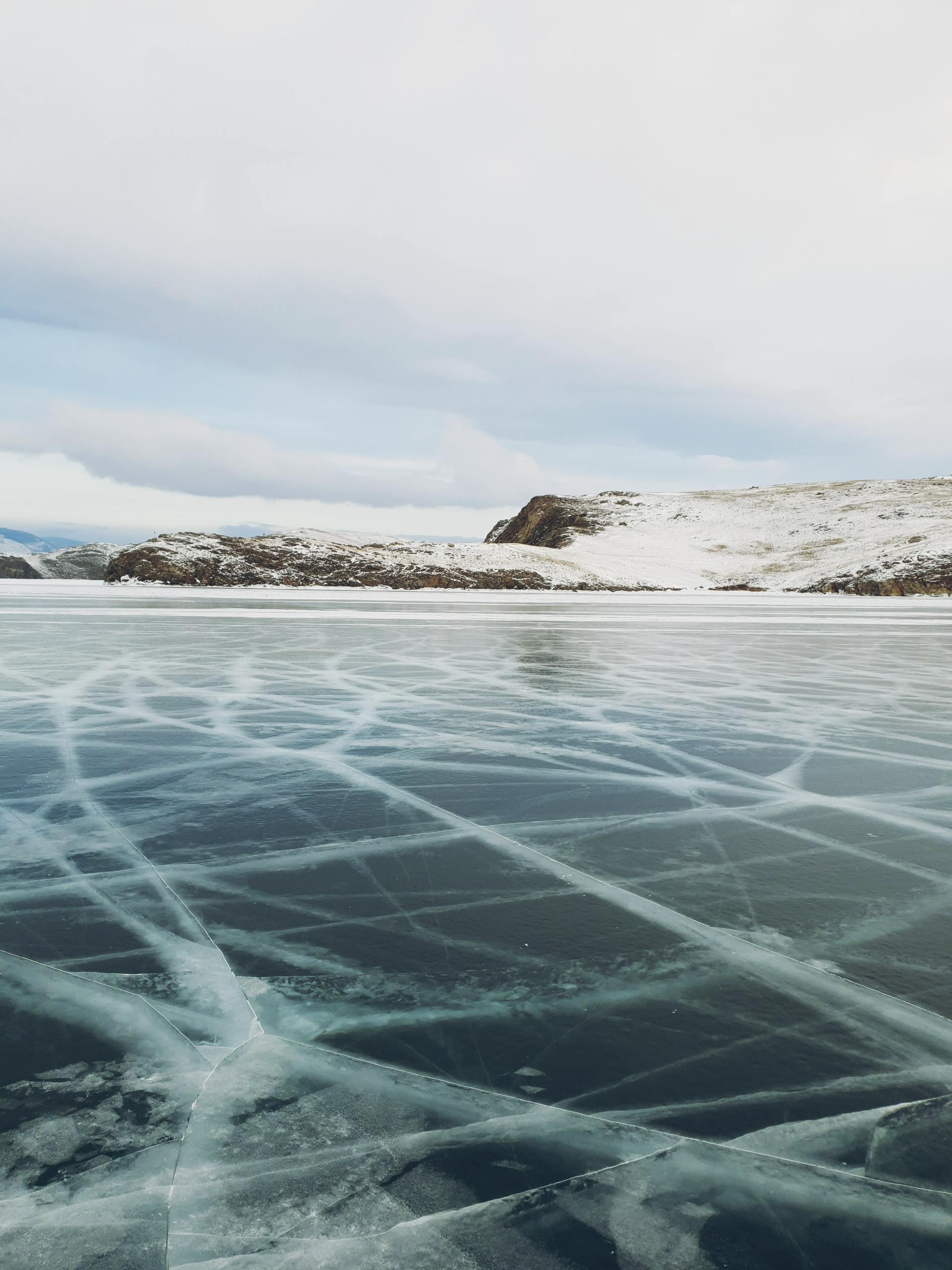 Cracks on Frozen Lake Baikal in Winter · Free