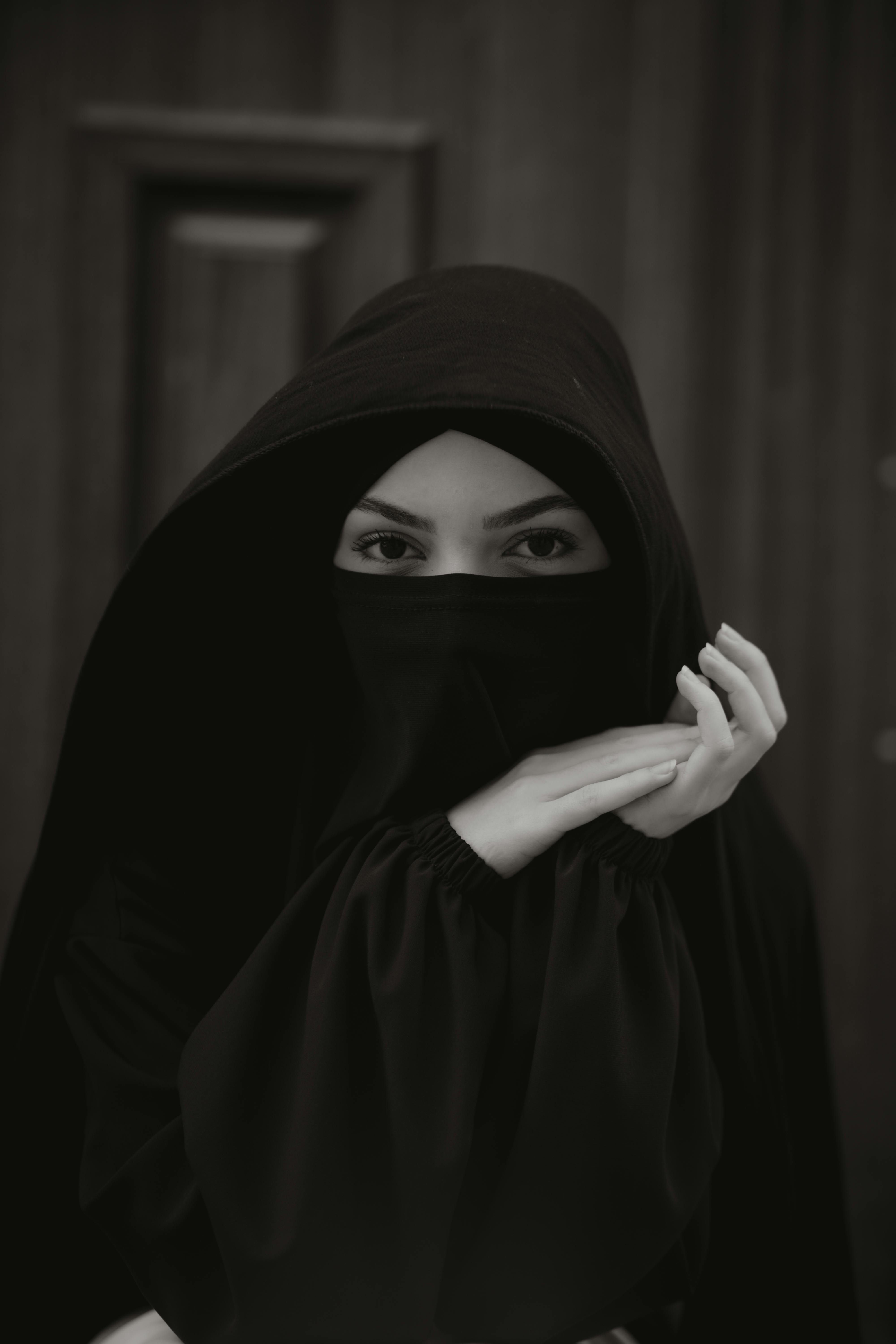 Woman Wearing a Hijab Covering Her Face · Free