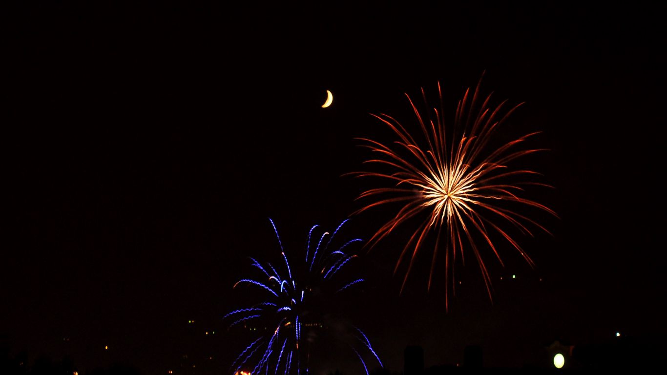 Download wallpaper 1366x768 fireworks, sparks, explosions, moon, night, dark tablet, laptop HD background