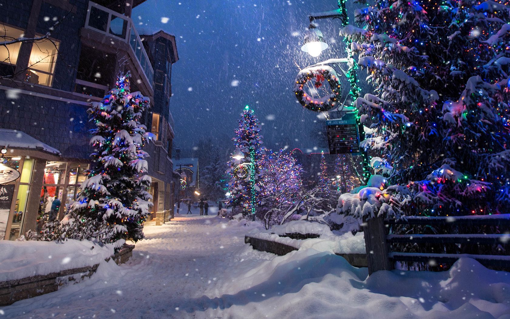 Download wallpaper 1680x1050 christmas, new year, winter, street, snowfall, mood widescreen 16:10 HD background